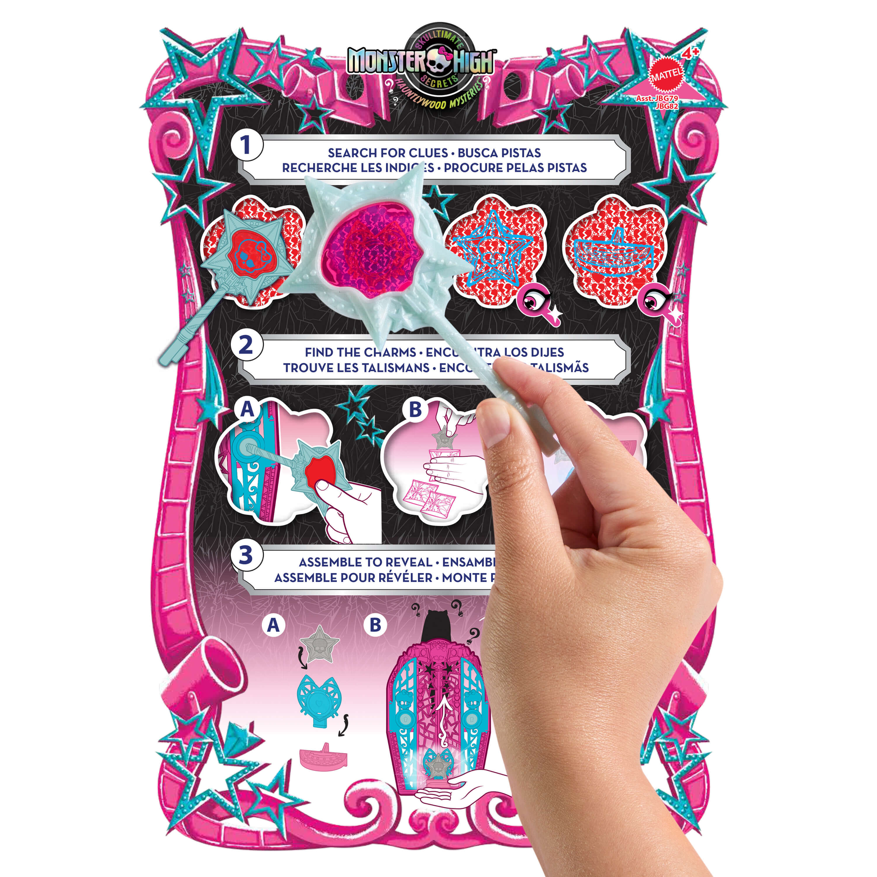 Una mano sostiene una varita de plástico sobre un tablero de juego rosa y negro con estrellas. Se muestran instrucciones.