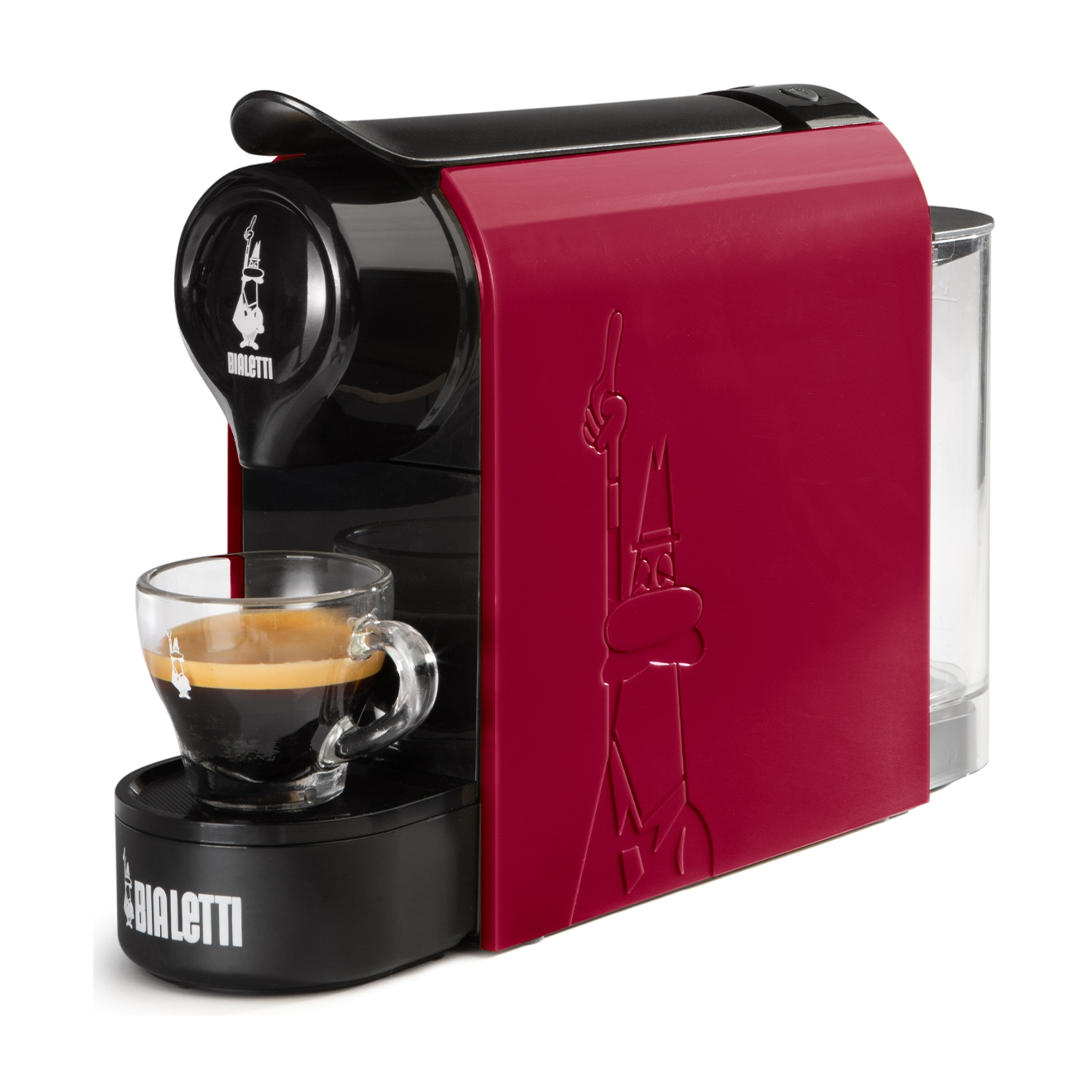 Una macchina per espresso Bialetti rossa e nera con un bicchiere di caffè. La macchina ha un serbatoio dell'acqua trasparente.