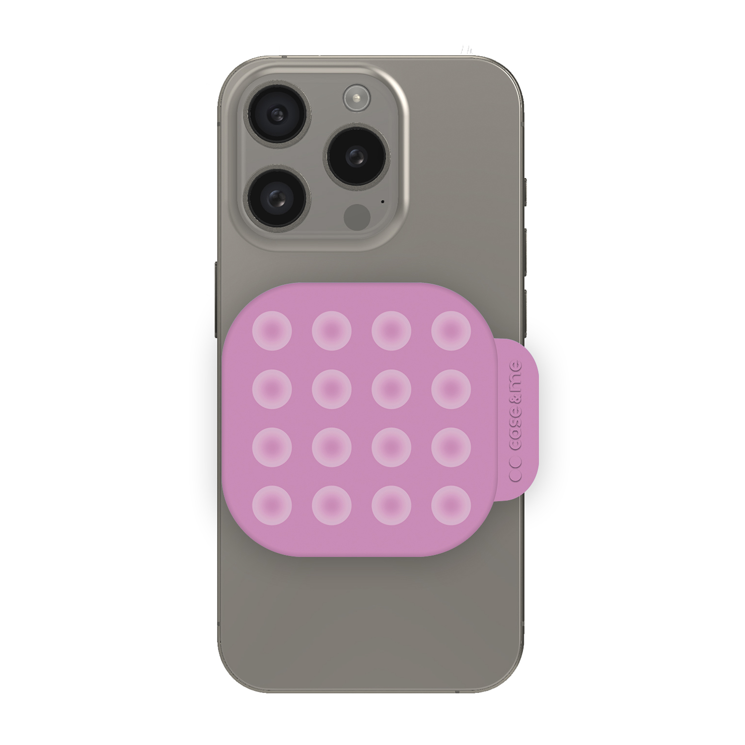 Un iPhone gris con un agarre de teléfono pop-it rosa adjunto. El agarre tiene una cuadrícula de burbujas circulares. La cámara del teléfono es visible.