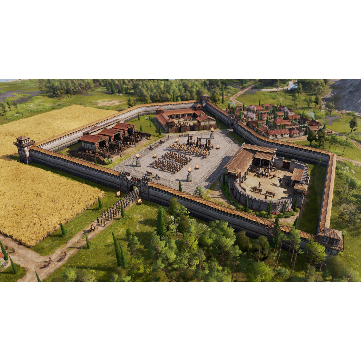 Vista aerea di una città romana fortificata. Edifici, soldati e un campo di grano sono racchiusi da mura di pietra. Alberi e colline.