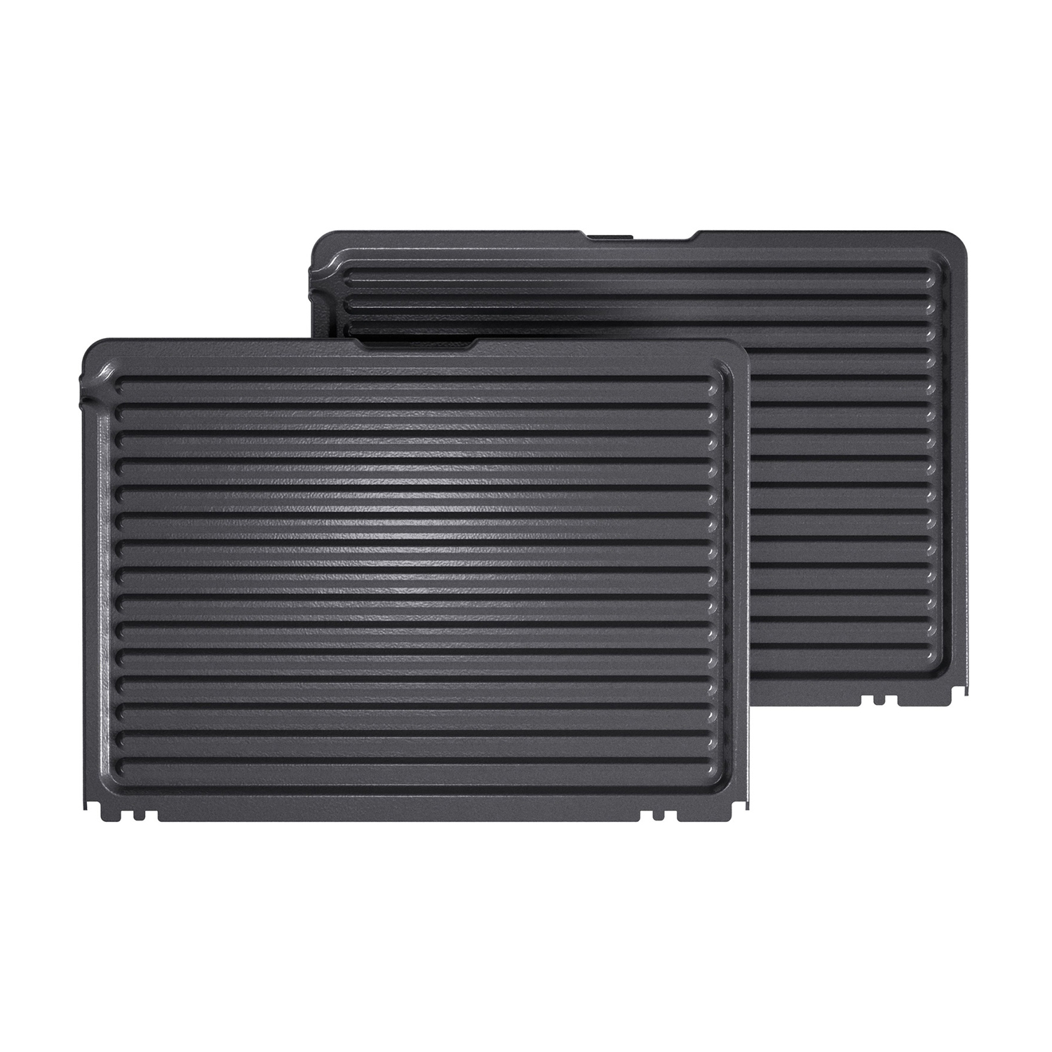 Two dark gray grill plates with horizontal ridges are stacked against a white background.