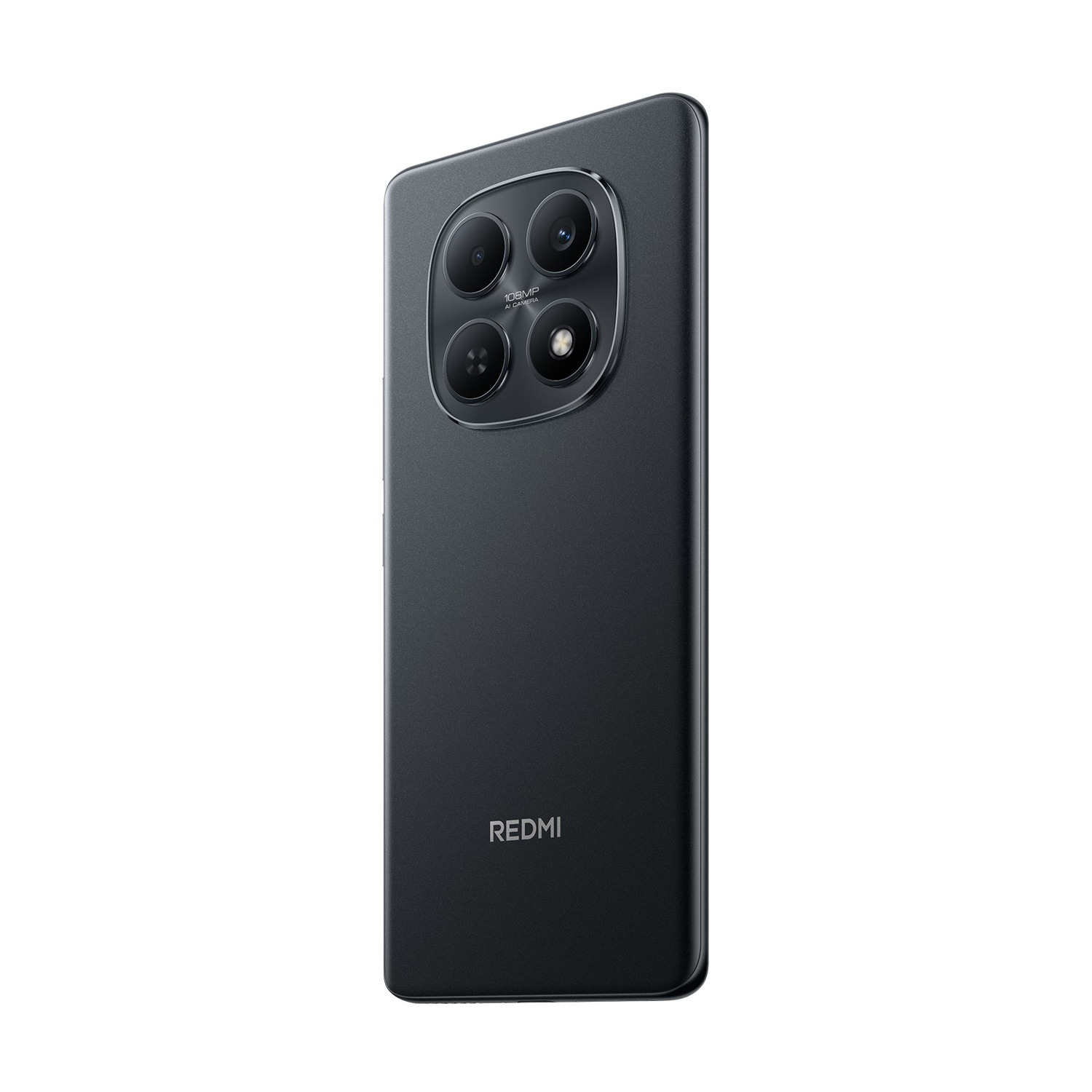Un smartphone gris oscuro muestra su parte trasera. Tiene cuatro lentes de cámara en un diseño circular y la palabra 'REDMI' abajo.