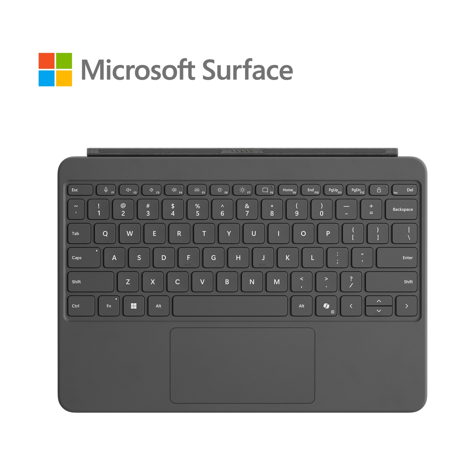 Una tastiera Microsoft Surface grigio scuro. Ha tasti, un touchpad e il logo Microsoft in alto.