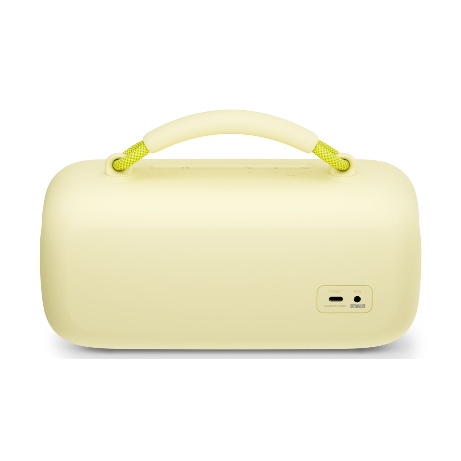 Żółty głośnik z uchwytem. Uchwyt ma żółto-zielone detale. Posiada porty wejścia/wyjścia i aux.