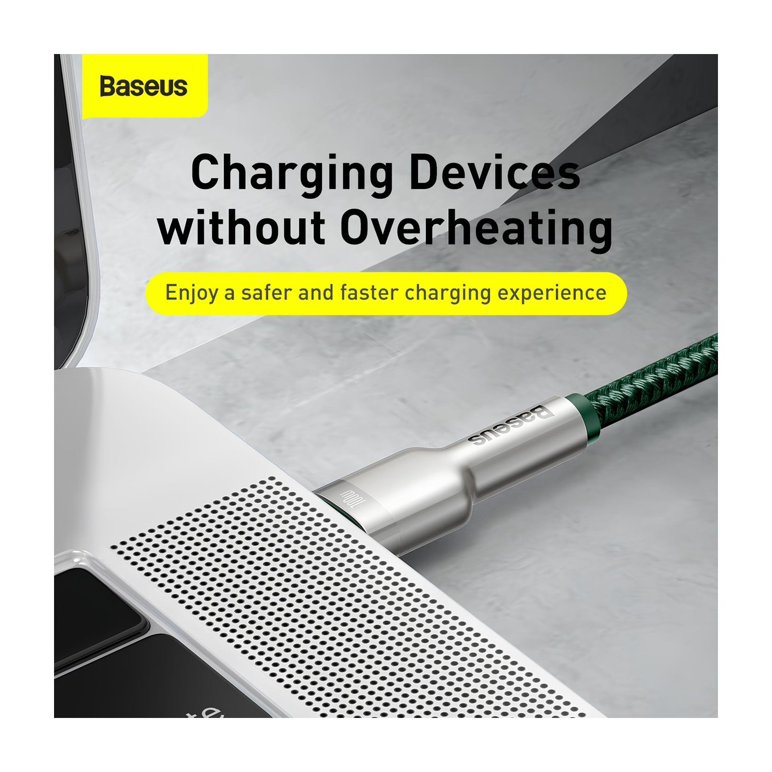 Laptop ładuje się srebrnym kablem. Tekst brzmi „Charging Devices without Overheating”, a u góry znajduje się „Baseus”.