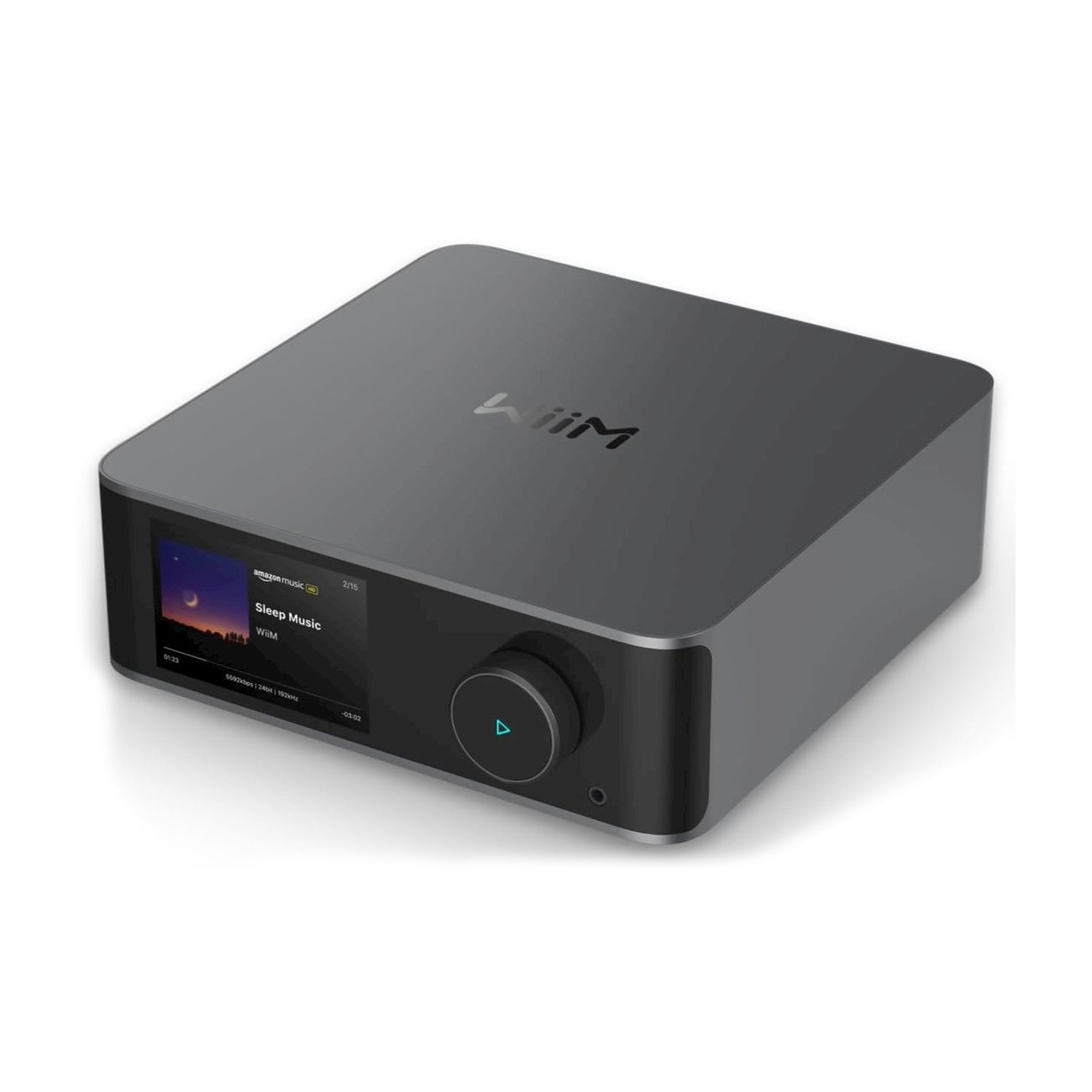 Graues WiiM-Audiogerät. Es hat einen Bildschirm mit der Aufschrift 'Sleep Music' und einen großen Knopf. Amazon Music HD-Logo sichtbar.