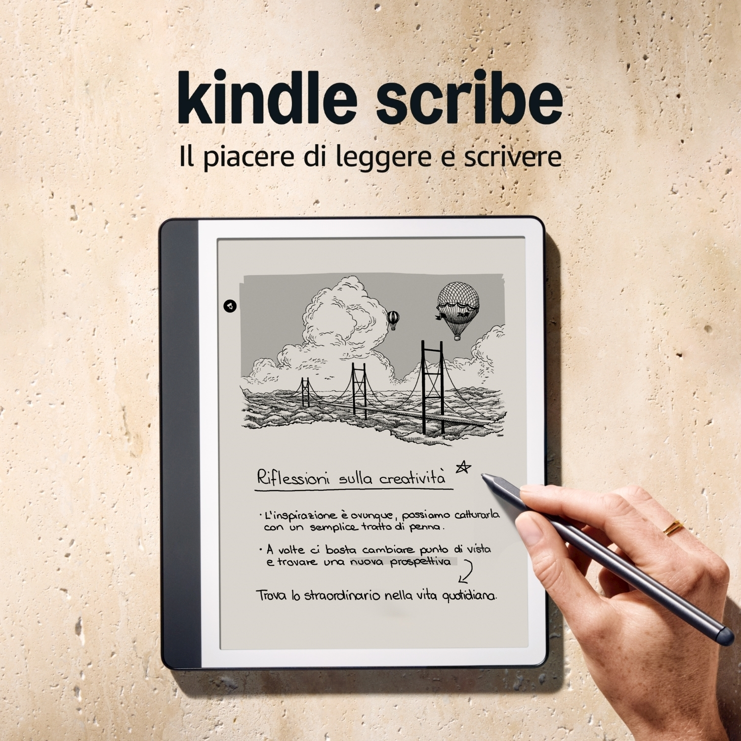 Ein Kindle Scribe mit einer Zeichnung einer Brücke und Heißluftballons. Eine Hand hält einen Stift. Text ist auf dem Bildschirm zu sehen.