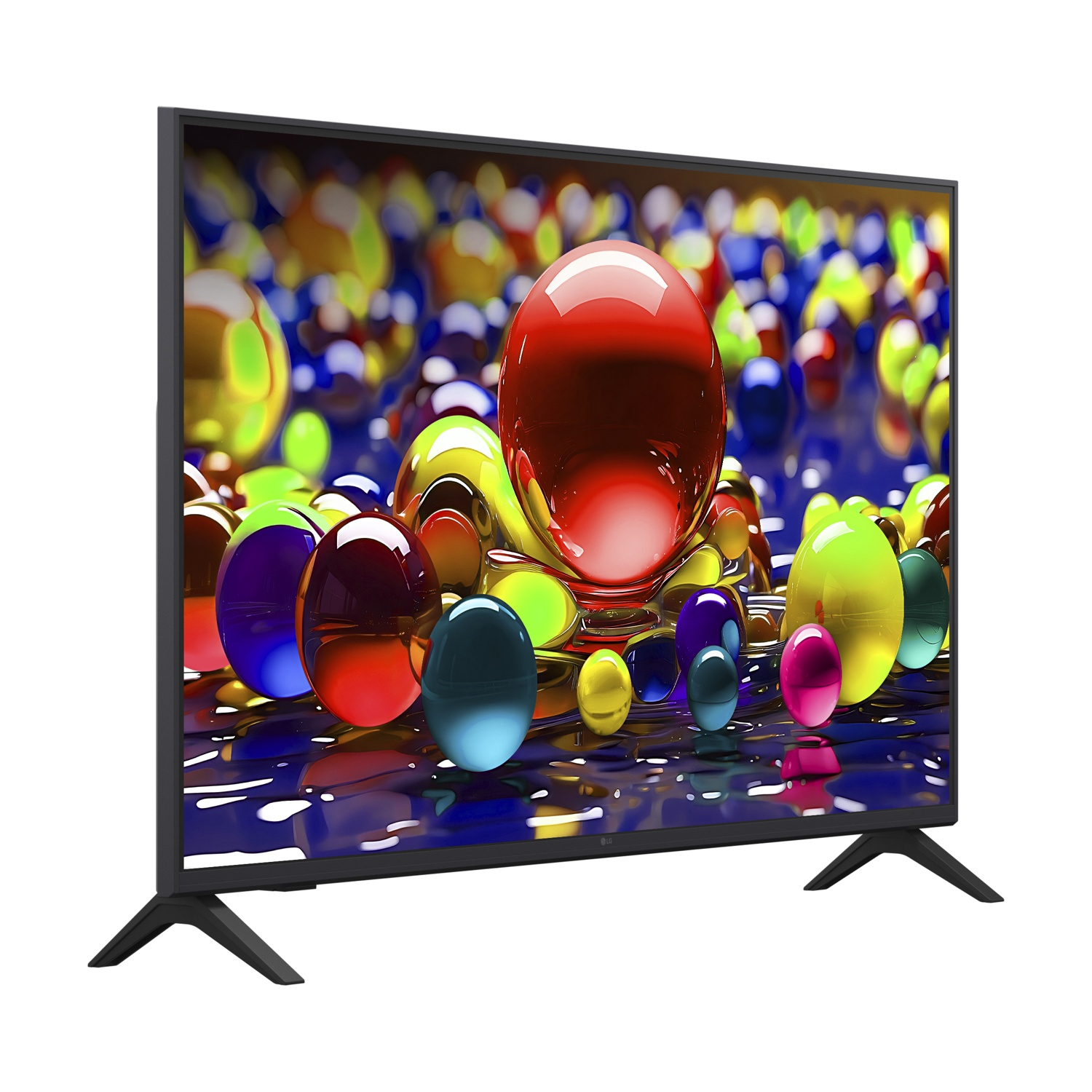 Un televisore mostra sfere colorate e lucide. Sfera rosse, gialle, blu e verdi sono a fuoco. Il televisore ha una cornice e un supporto neri.