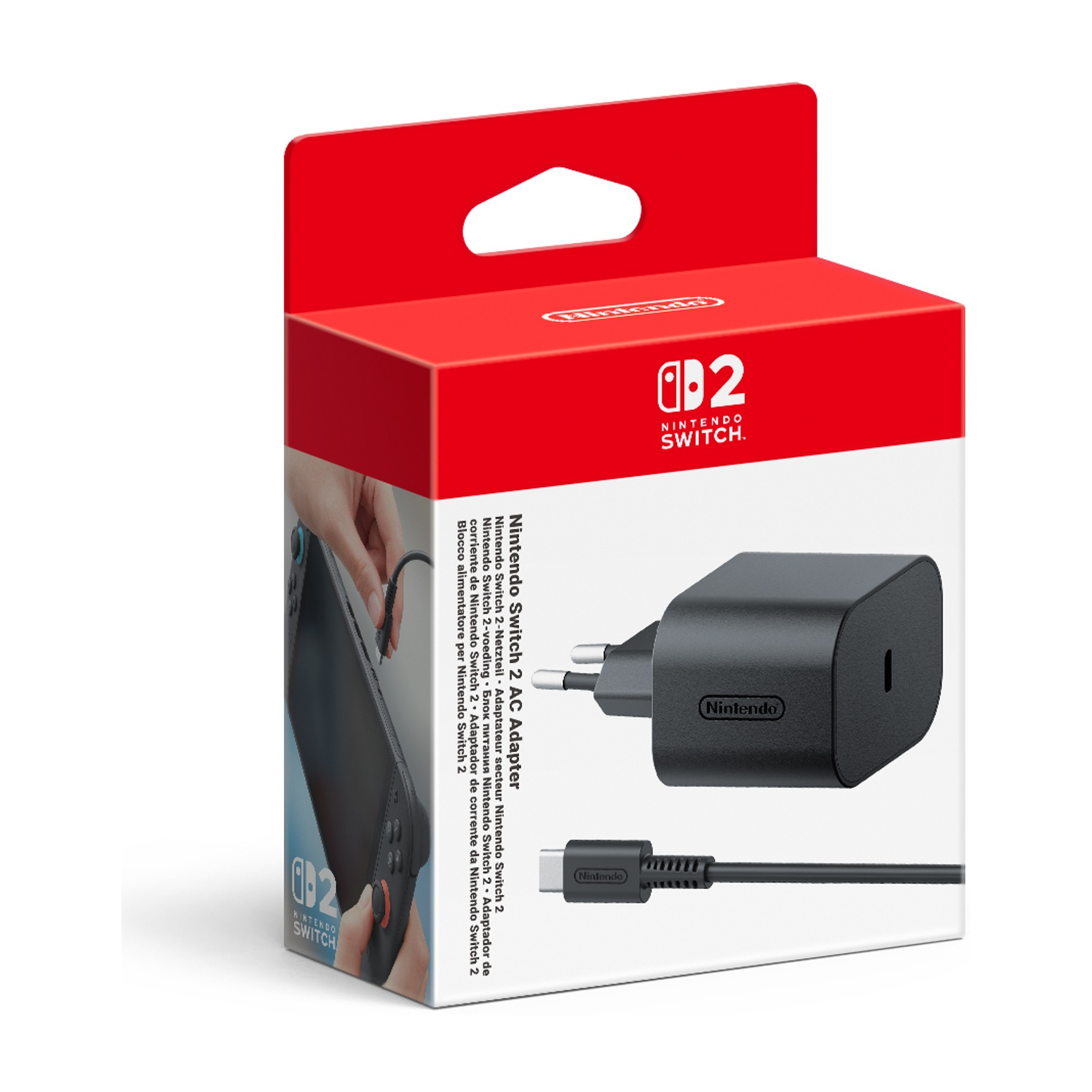 Czerwono-białe pudełko z ładowarką Nintendo Switch. Ładowarka jest czarna, z kablem i widocznym logo Nintendo.