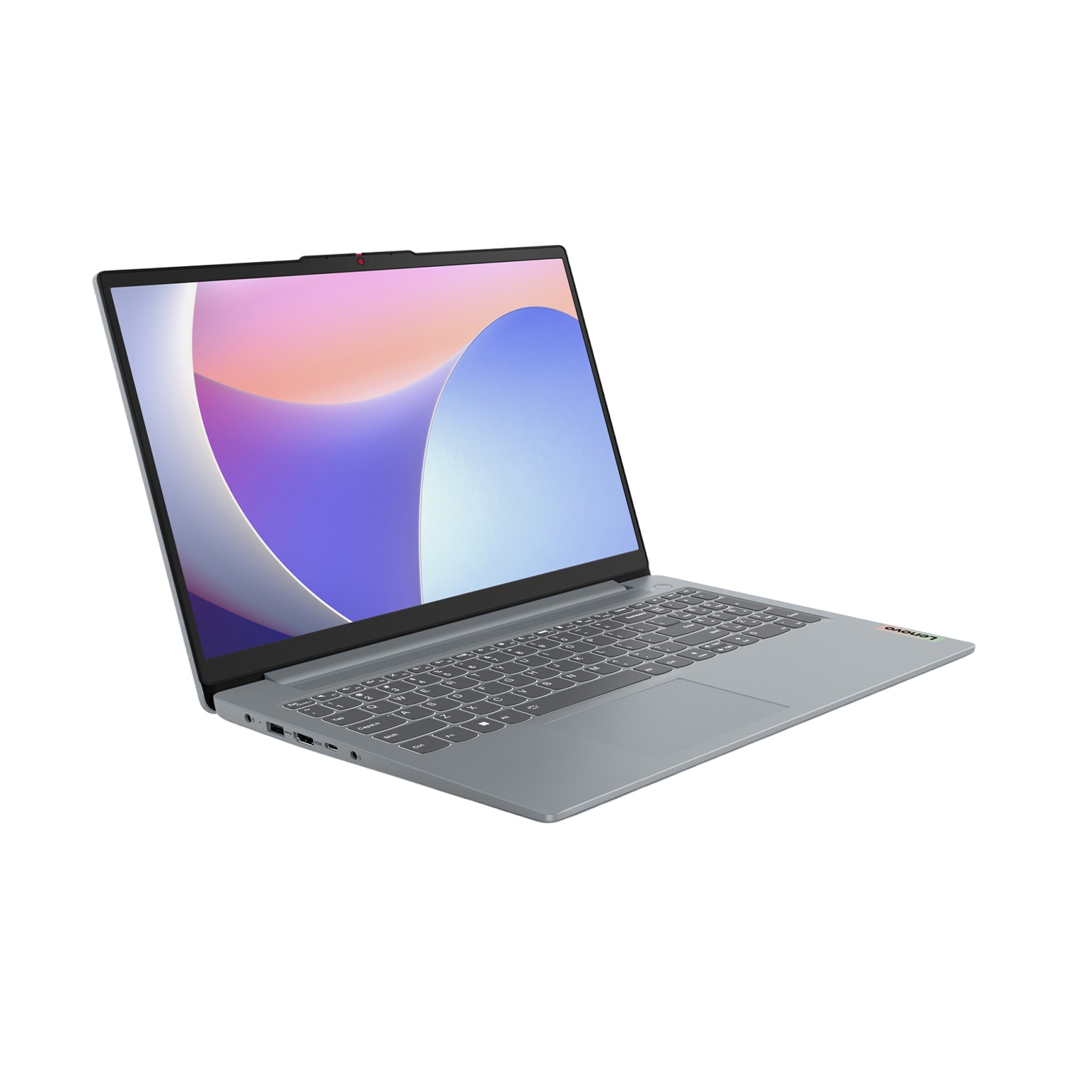 Un laptop Lenovo grigio è aperto, con schermo colorato. Tastiera e touchpad visibili. Lo sfondo è bianco.