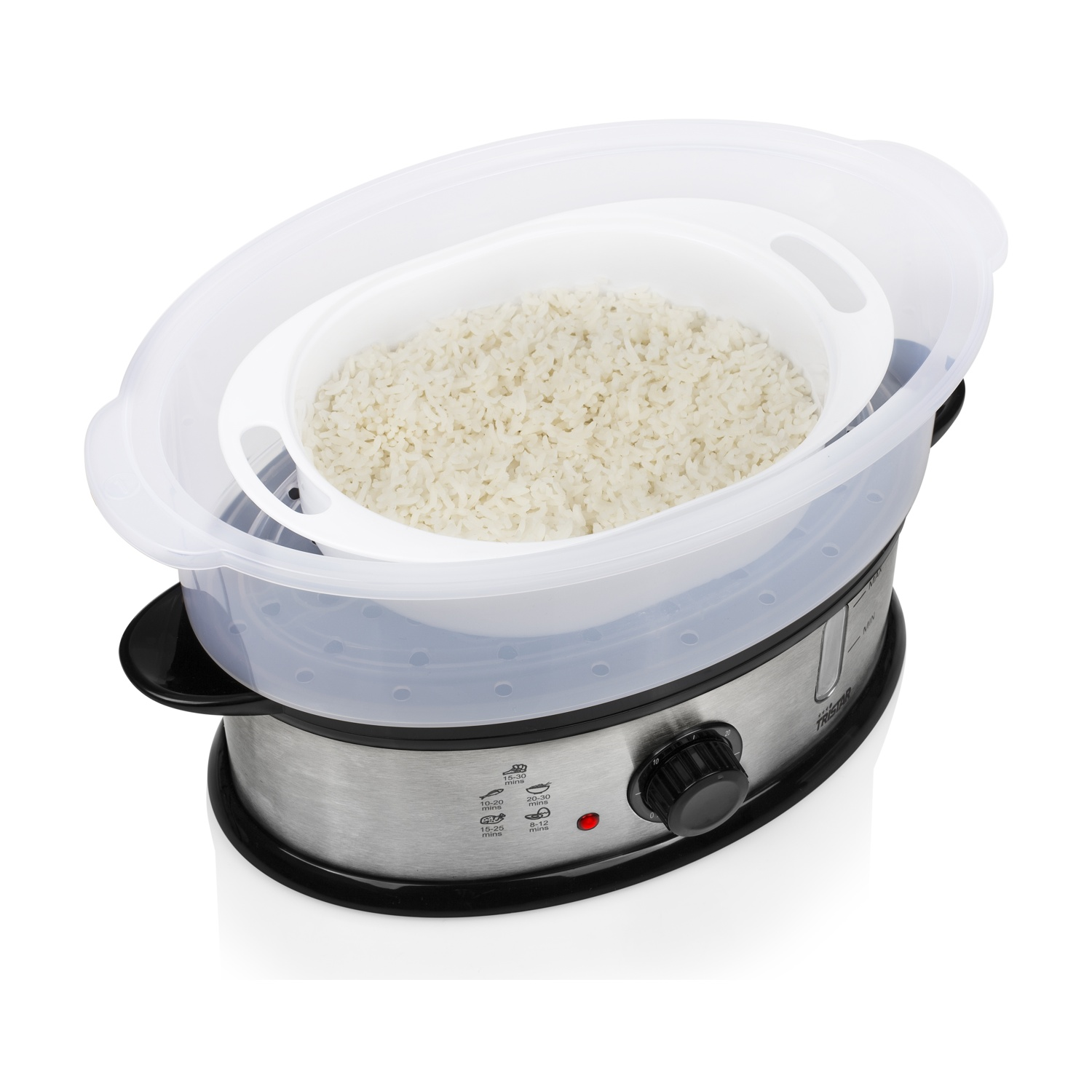 Una vaporera de arroz con arroz dentro. Tiene una tapa transparente y una base plateada con una perilla negra. Una luz roja está encendida.