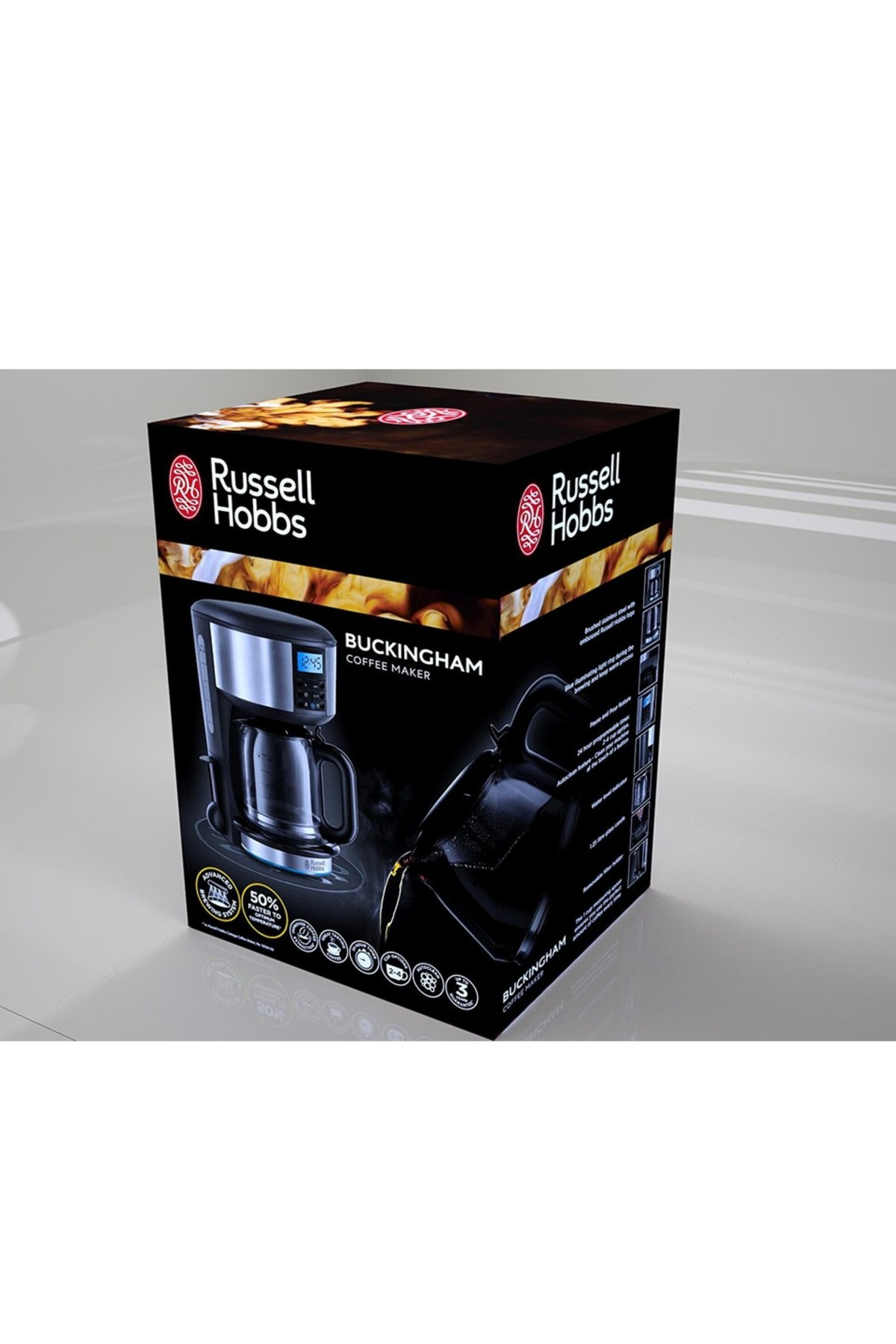 Se muestra una caja de la cafetera Russell Hobbs Buckingham. La caja es negra con imágenes de la cafetera y el logotipo de la marca.