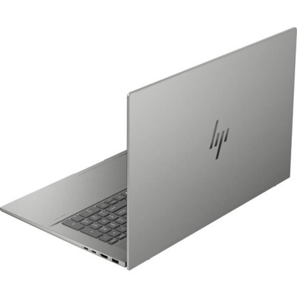 Szary laptop HP jest otwarty. Klawiatura jest widoczna, a logo HP znajduje się z tyłu. Tło jest białe.