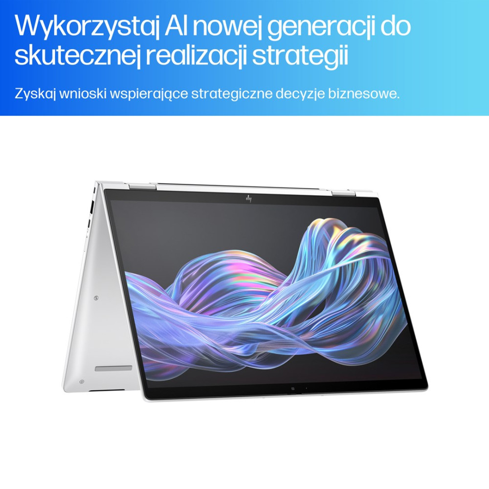 Srebrny laptop z ekranem wyświetlającym kolorową sztukę abstrakcyjną jest lekko otwarty. Tekst po polsku u góry.