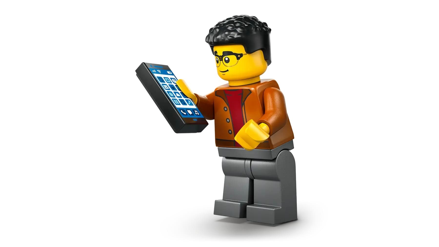 Figurka Lego z okularami i telefonem. Postać ma brązową kurtkę i szare spodnie, trzymając czarny telefon.