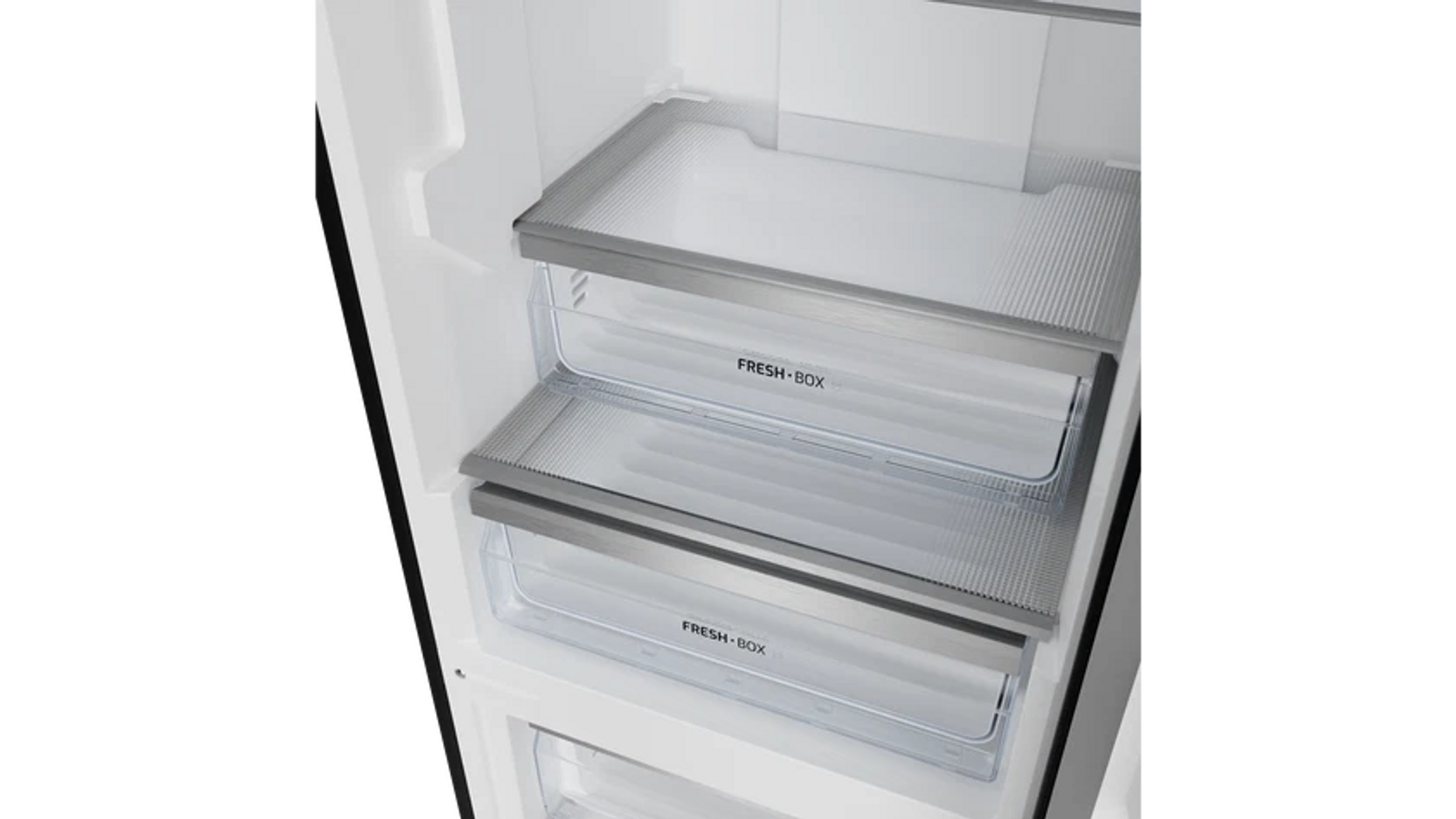 Interior de un refrigerador que muestra dos cajones rectangulares transparentes etiquetados 'FRESH-BOX' apilados uno encima del otro.