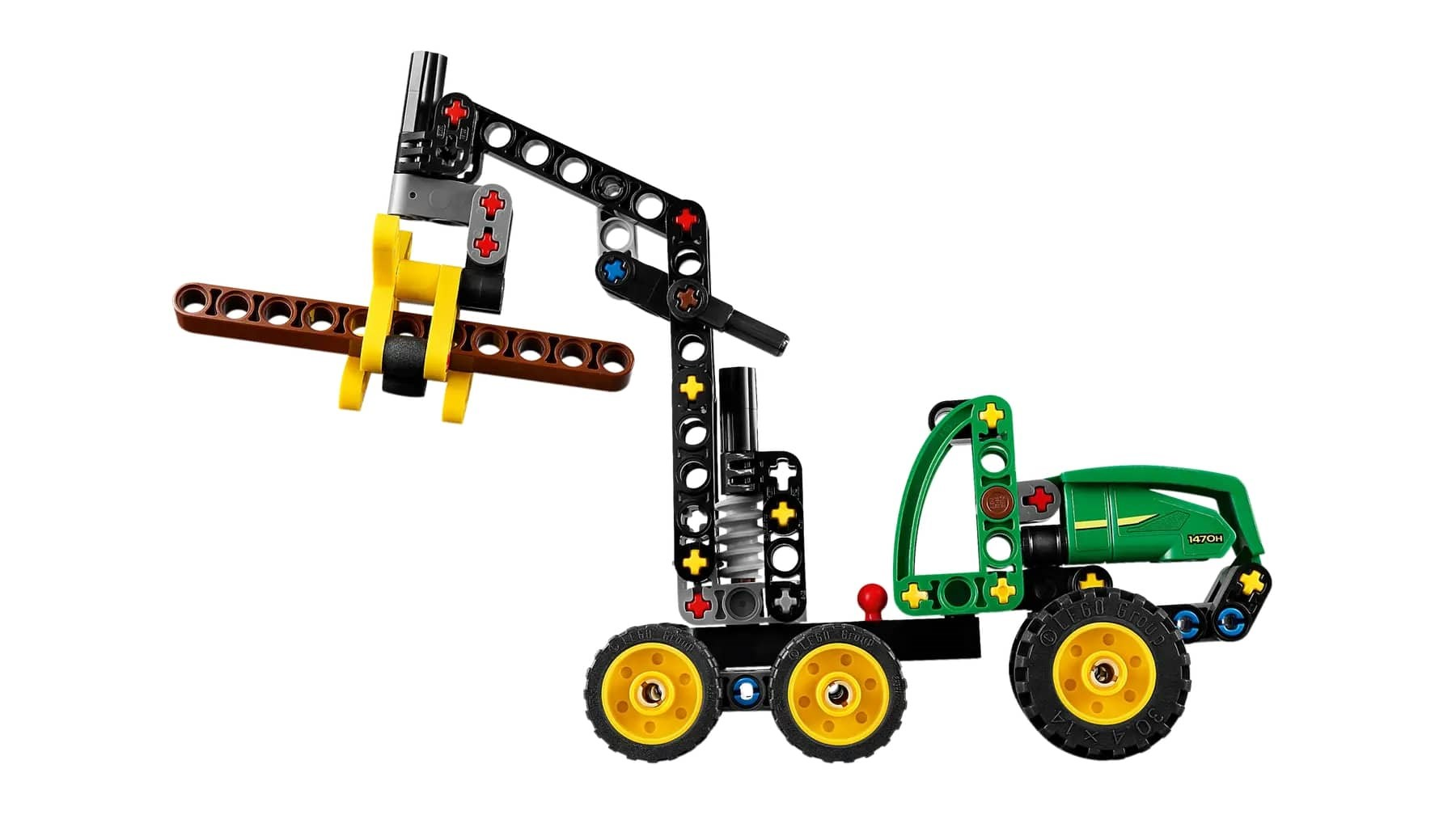 Zielony i czarny traktor Lego z ramieniem podnoszącym. Ma żółte koła i brązowe mocowanie do trzymania przedmiotów.