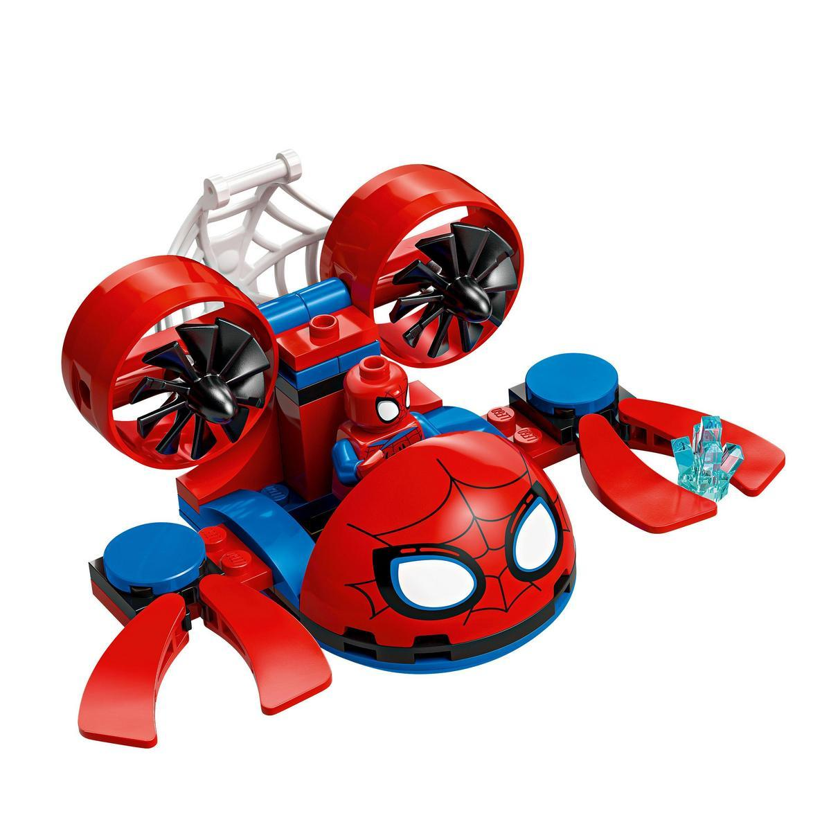 Pojazd Lego Spider-Man, czerwono-niebieski, z dwoma śmigłami i figurką Spider-Mana. Biała pajęczyna w tle.