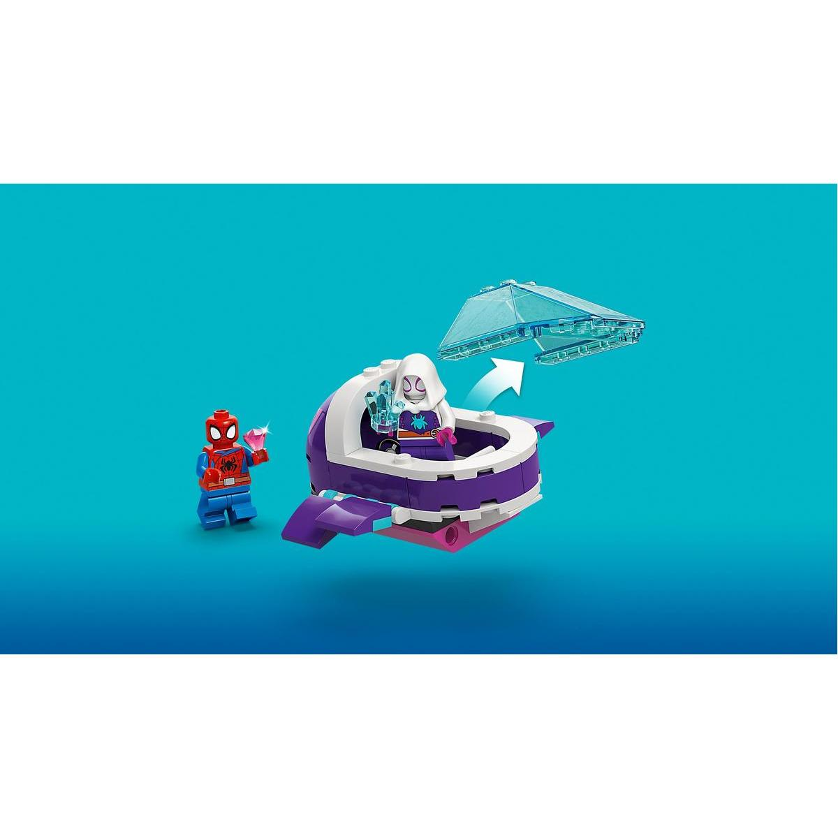 Zestaw Lego z minifigurkami Spider-Mana i Spider-Gwen. Spider-Gwen w fioletowo-białym pojeździe. Nad nim przezroczysty niebieski dach.