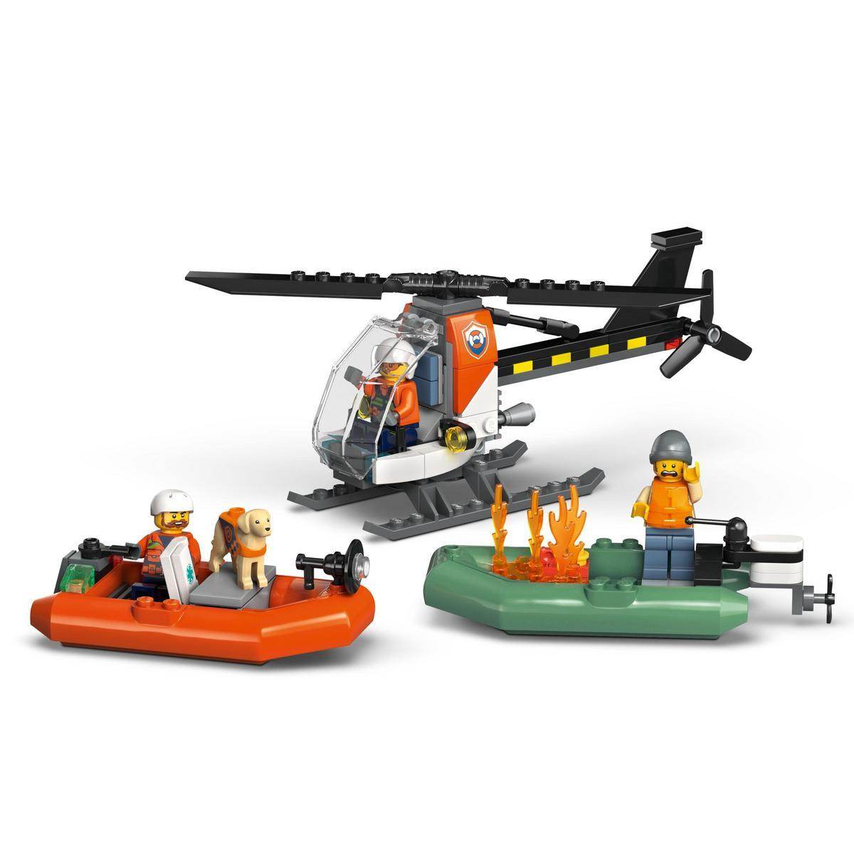 Zestaw ratunkowy LEGO: helikopter, dwie łodzie i minifigurki. Jedna łódź ma ogień, druga psa. Helikopter ma pomarańczowe akcenty.
