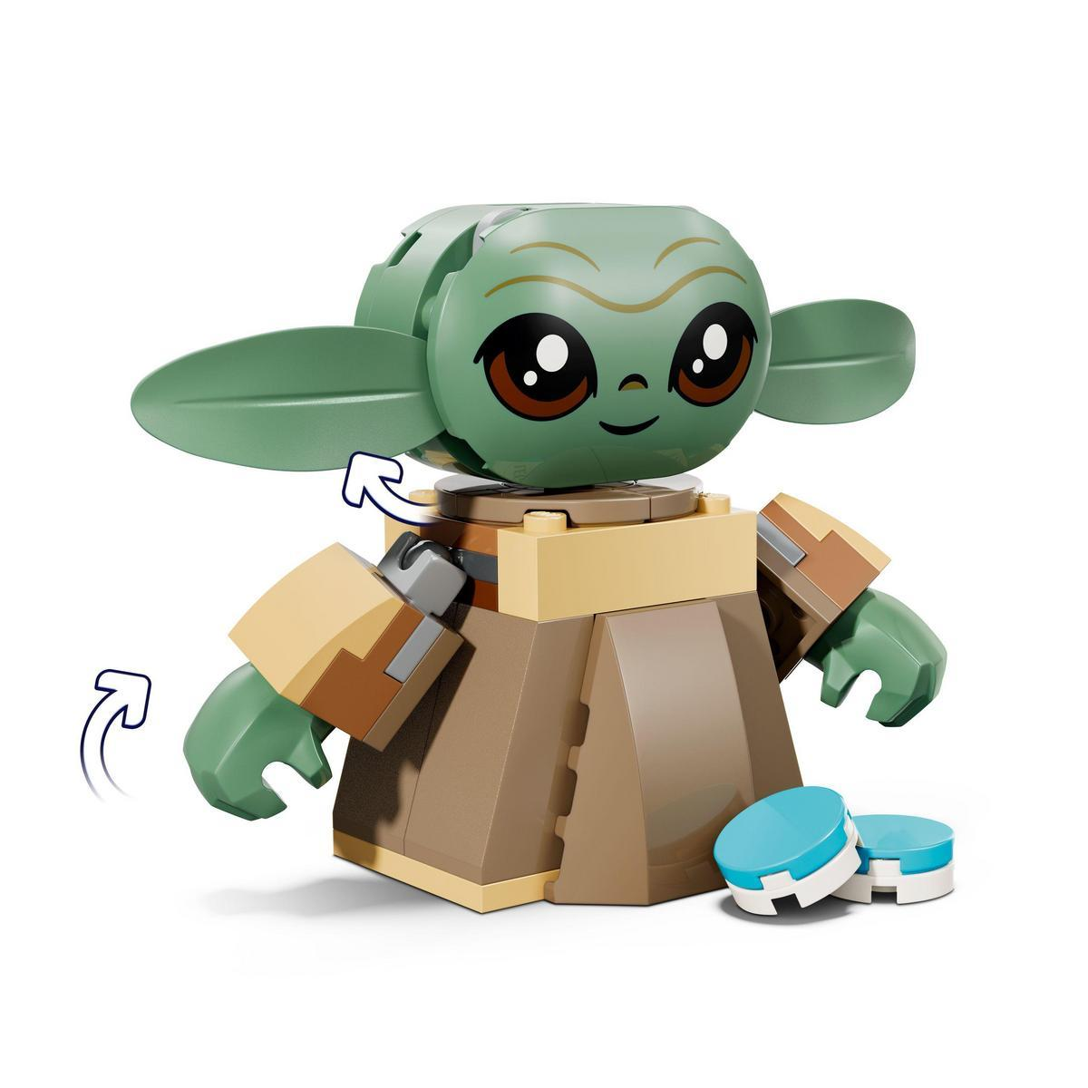 Figurka Lego Grogu (Baby Yoda) z dużymi uszami, brązowymi oczami i beżową szatą. Dwa niebiesko-białe dyski z przodu.