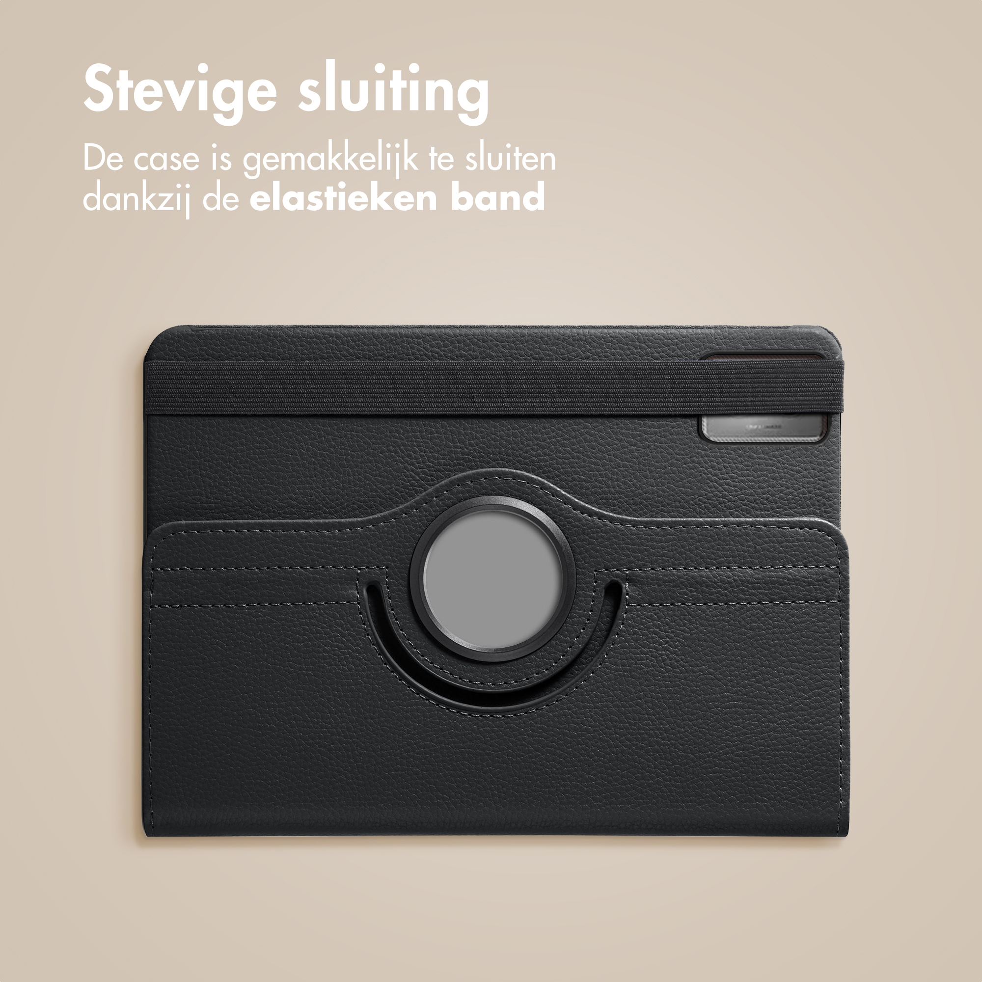 Black tablet case with elastic band closure. Gray circular holder in the middle. Beige background.
