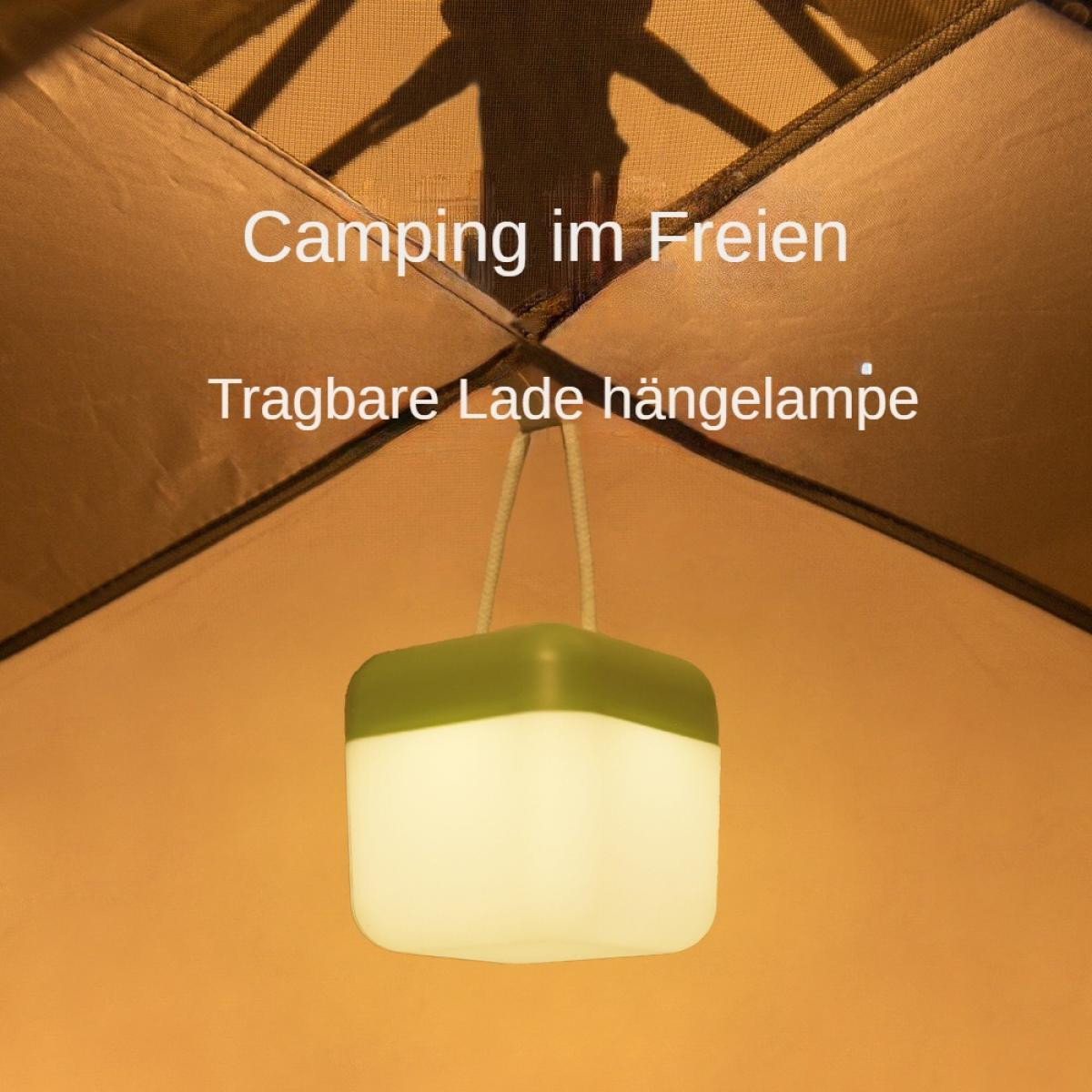 Eine Campingszene mit einer Hängelampe. Die Laterne ist weiß und grün. Der Text lautet 'Camping im Freien' und 'Tragbare Lade hängelampe'.
