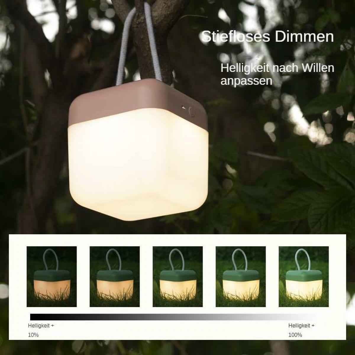 Eine leuchtende Laterne hängt an einem Baum. Das Bild zeigt die Helligkeitsstufen der Laterne. Die Laterne hat einen braunen Deckel und weißes Licht.