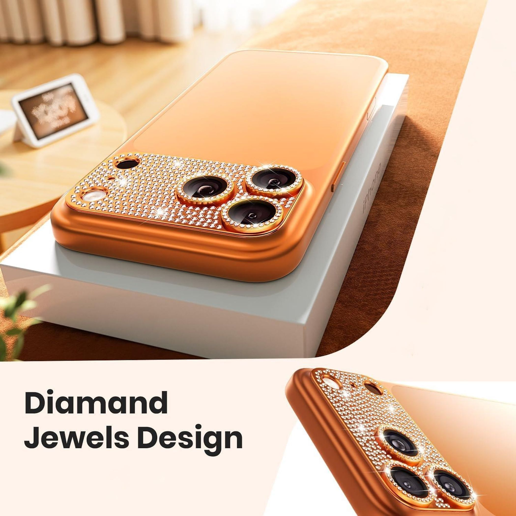 Una custodia arancione per telefono con gioielli di diamanti, posta su una scatola bianca. Un piccolo display è visibile sullo sfondo.