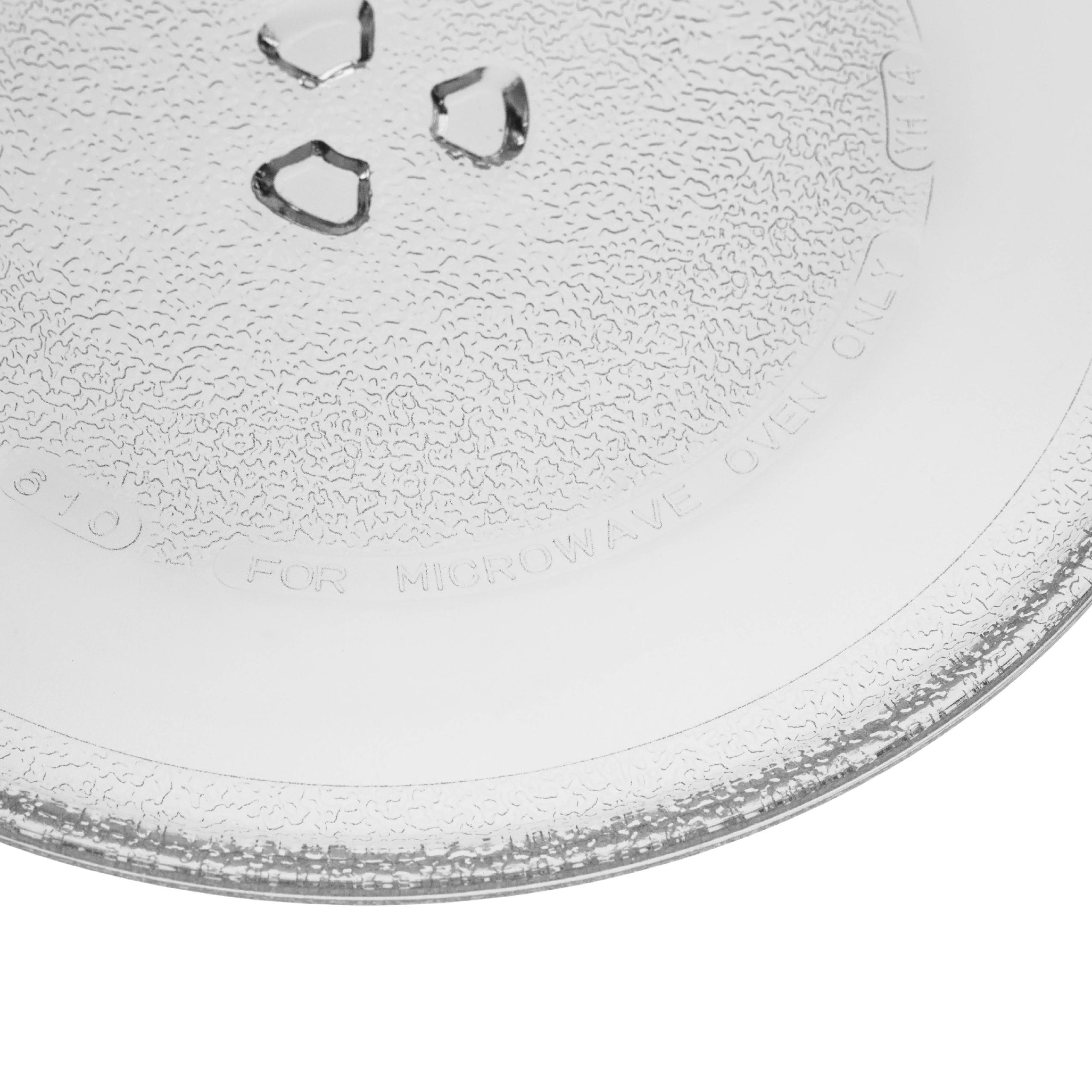 Gezeigt wird ein durchsichtiger Mikrowellenofenteller mit strukturierter Oberfläche und dem Aufdruck 'FOR MICROWAVE OVEN ONLY'.