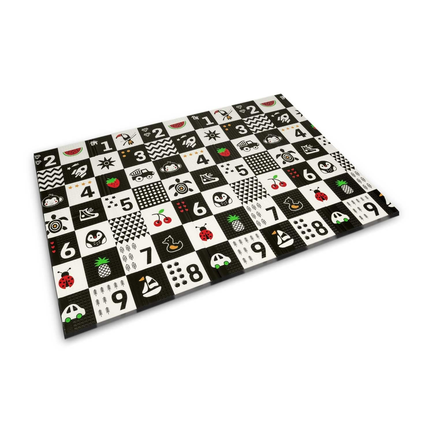 Una alfombra de juego en blanco y negro con números e imágenes de frutas, animales y objetos.