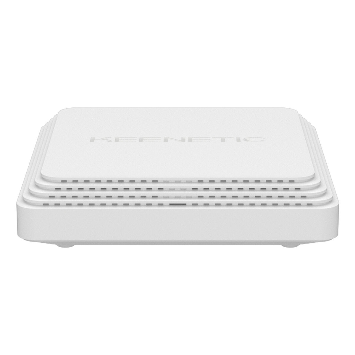 Yuvarlak kenarlı beyaz bir Keenetic yönlendirici. Havalandırma yuvalarına ve üstte marka adına sahip.