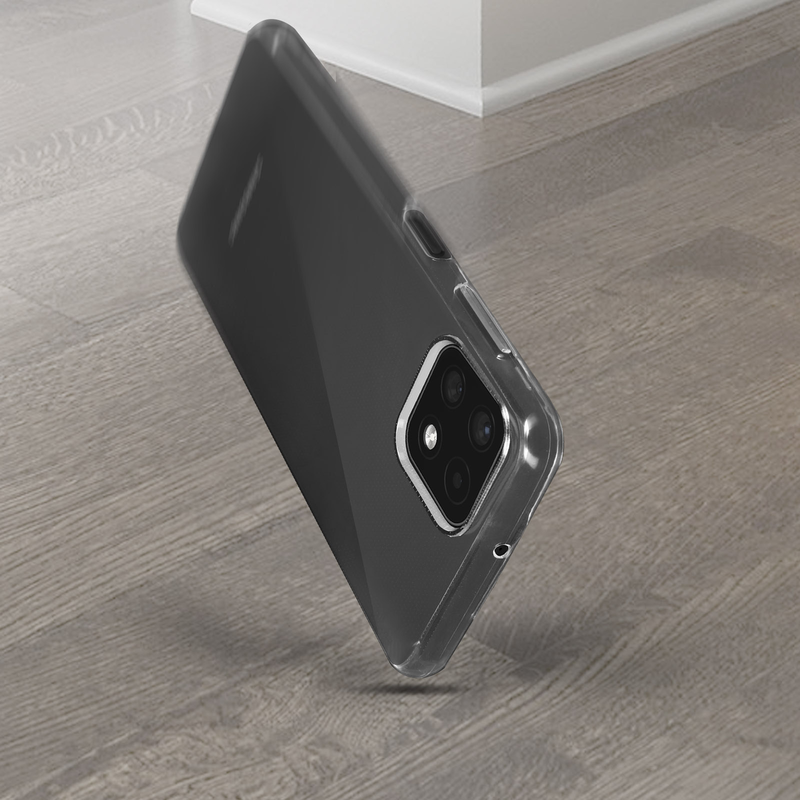 Una custodia trasparente con modulo fotocamera su superficie in legno.