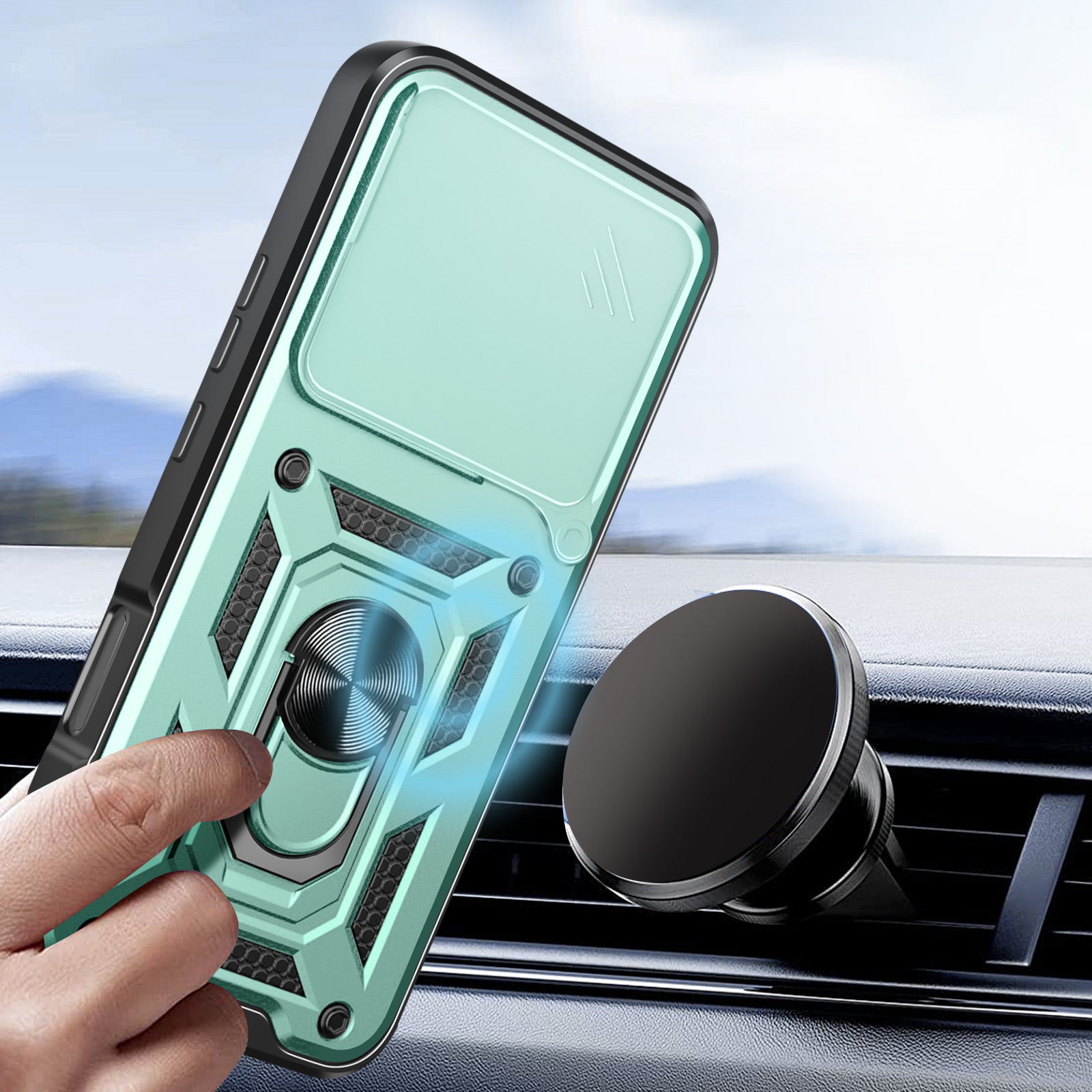 Una custodia per telefono verde menta con un anello di supporto è tenuta vicino a un supporto per telefono per bocchetta dell'auto nero.