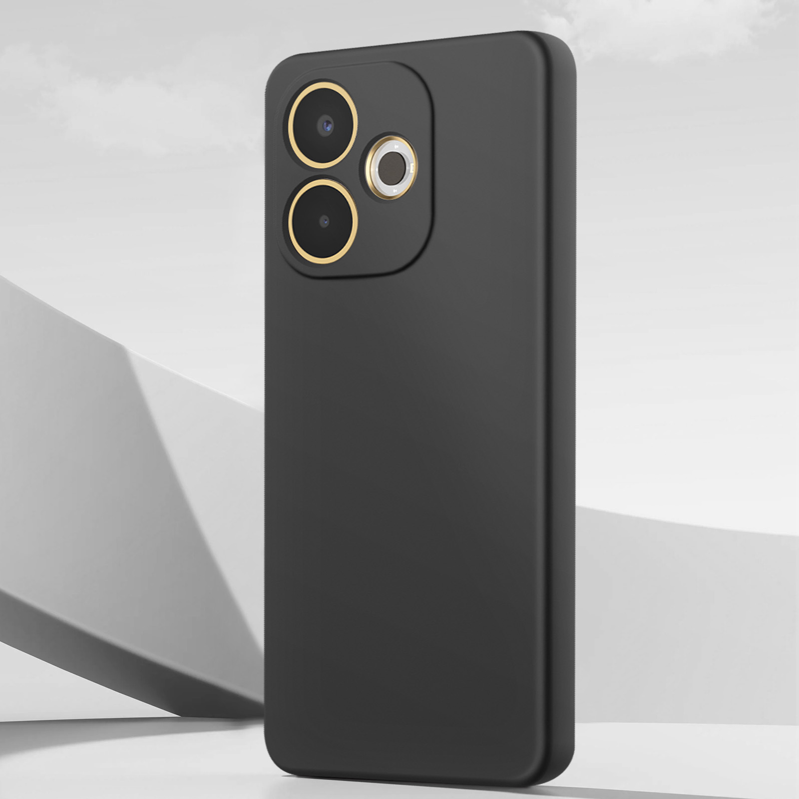 Smartphone nero con lenti della fotocamera bordate d'oro su sfondo bianco e grigio.