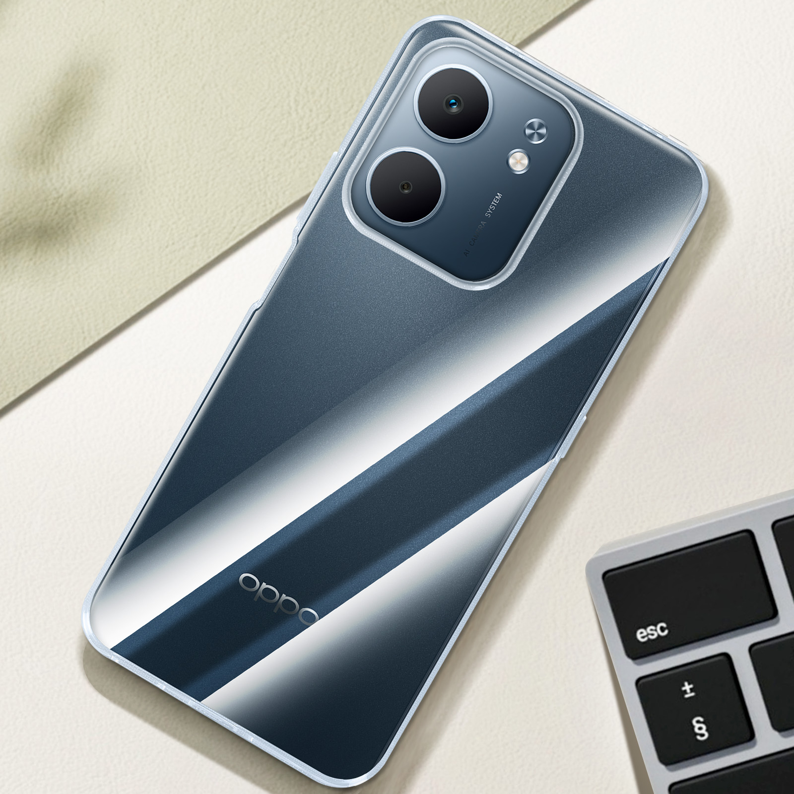 Telefono blu in custodia su superficie beige, con tastiera. Logo Oppo visibile.