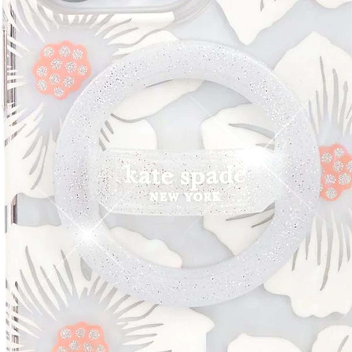Una custodia per telefono con un design floreale bianco. Un anello glitterato circonda il logo Kate Spade.