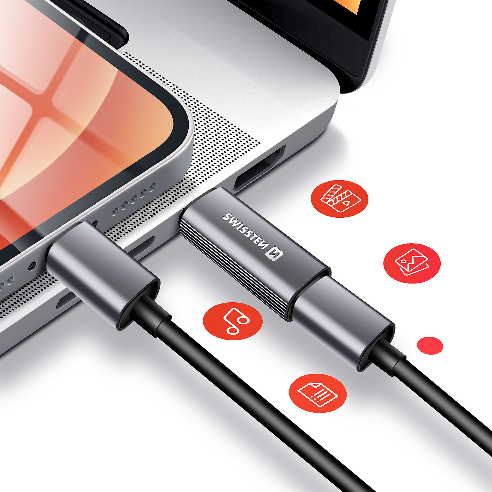 Un câble USB-C gris connecte un téléphone à un ordinateur portable. Des icônes rouges avec des symboles de film, photo et musique sont visibles.