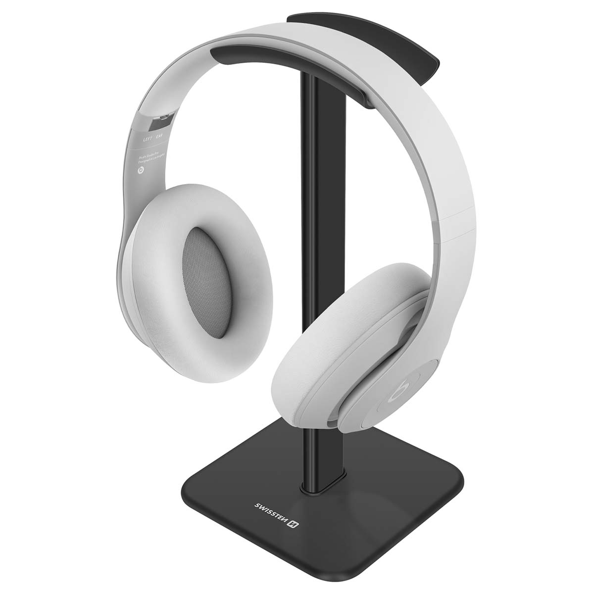 Auriculares blancos sobre un soporte negro. El soporte tiene una base cuadrada y un soporte vertical. Los auriculares son Beats.