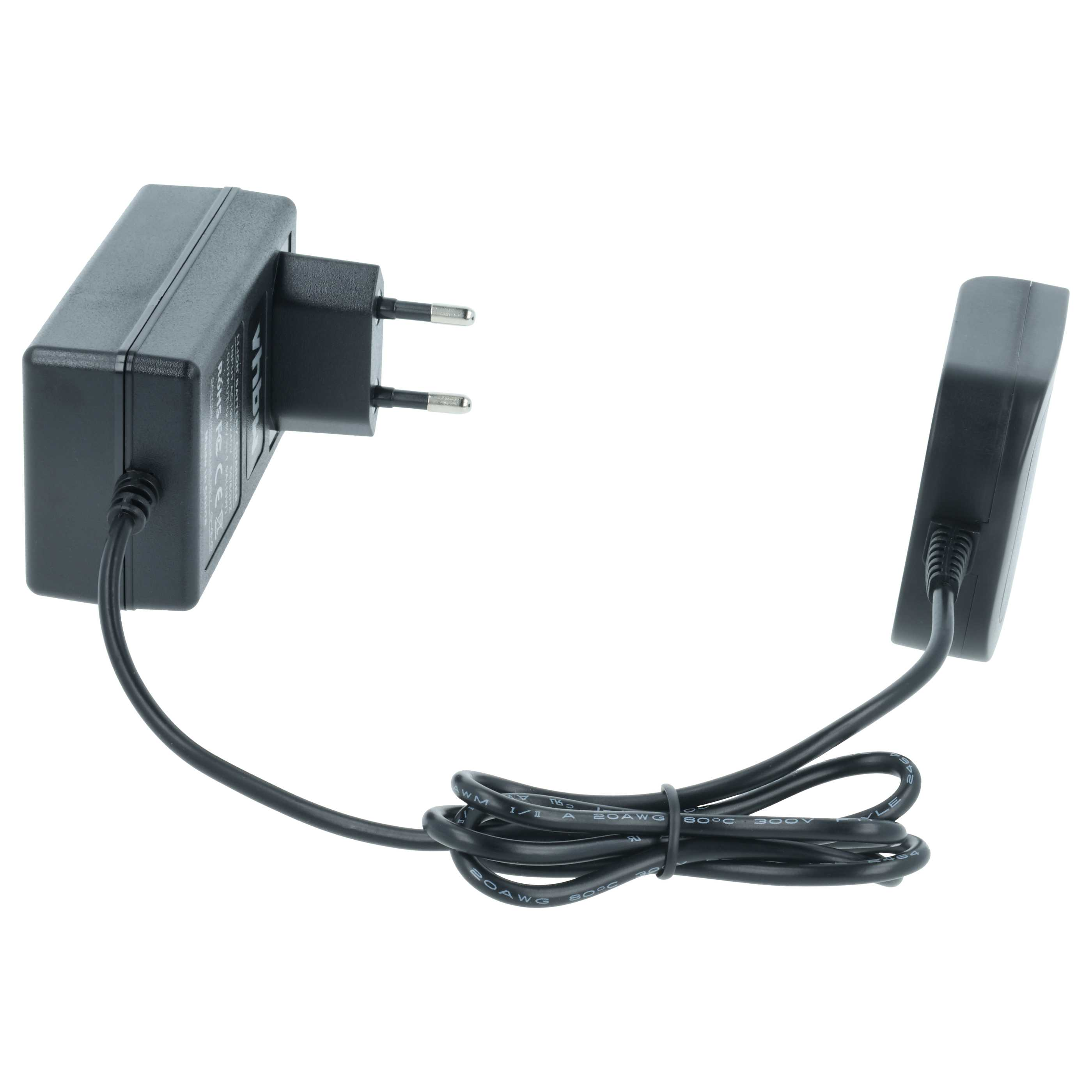 Ein schwarzes Netzteil mit Stecker und eine kleine schwarze Box. Sie sind durch ein schwarzes Kabel verbunden.