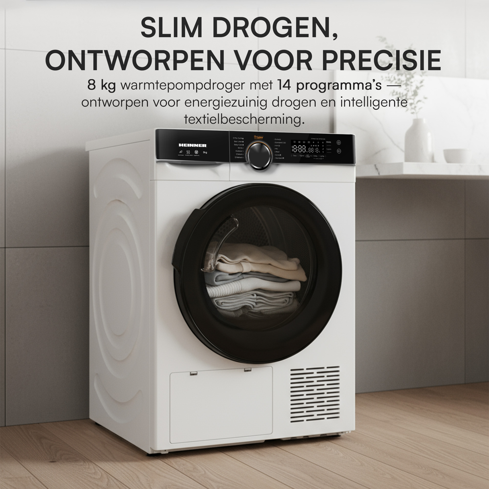 Ein weißer Trockner mit schwarzer Tür, gefüllt mit Kleidung. Text darüber lautet: SLIM DROGEN, ONTWORPEN VOOR PRECISIE.