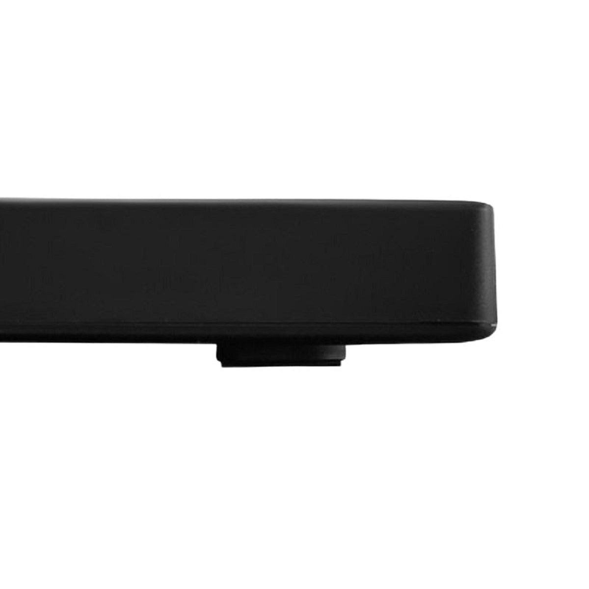 Primer plano de un objeto rectangular negro con base circular. El fondo es blanco, resaltando la forma del objeto.