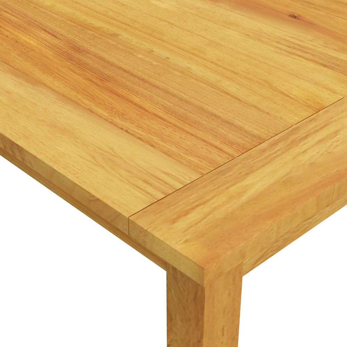 Primo piano di un angolo di tavolo in legno. Il tavolo ha venature del legno marrone chiaro, forma rettangolare e una gamba visibile.