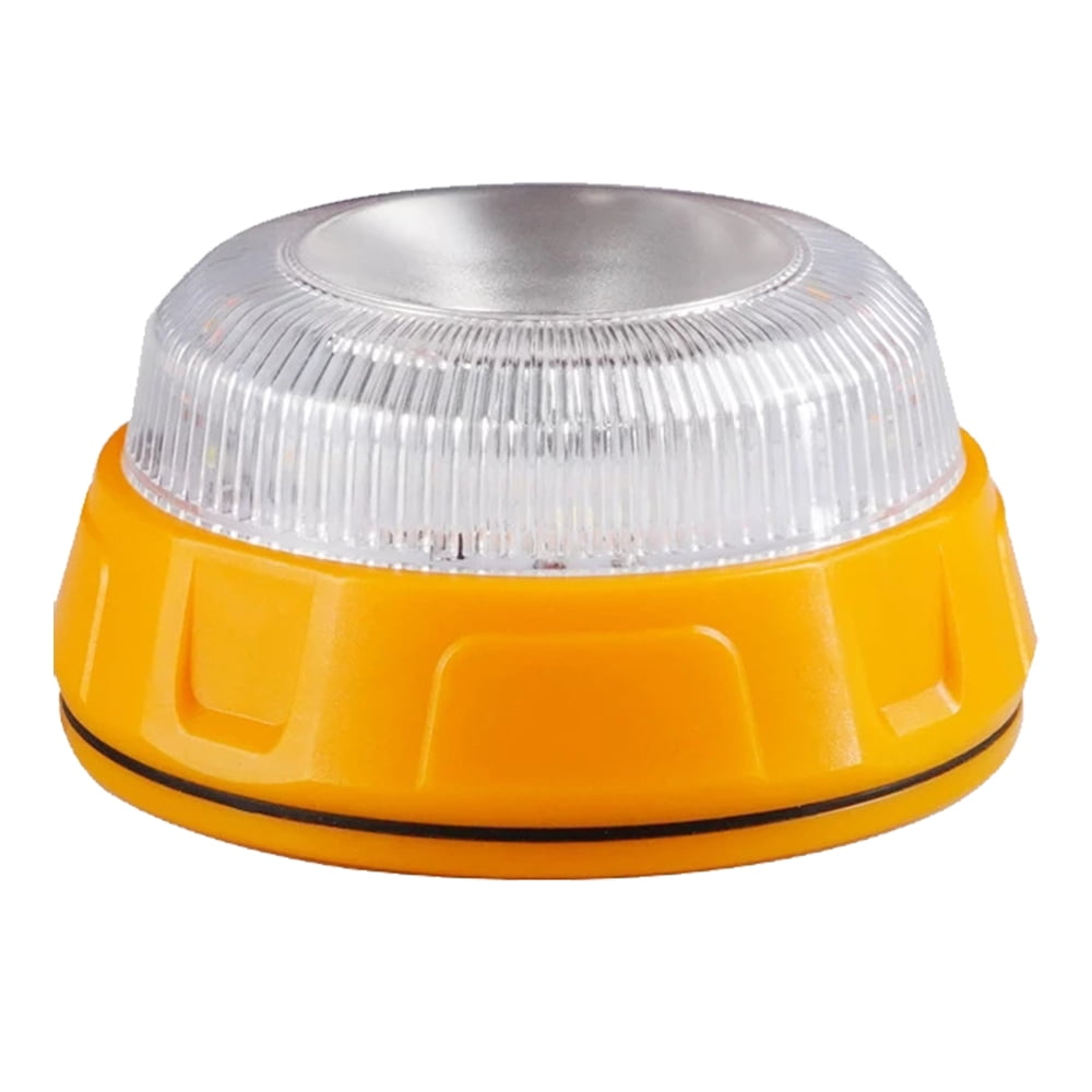 Ein gelbes und klares Notlicht. Es hat einen abgerundeten Sockel und eine klare, geriffelte Oberseite. Die Oberseite ist mit LEDs beleuchtet.