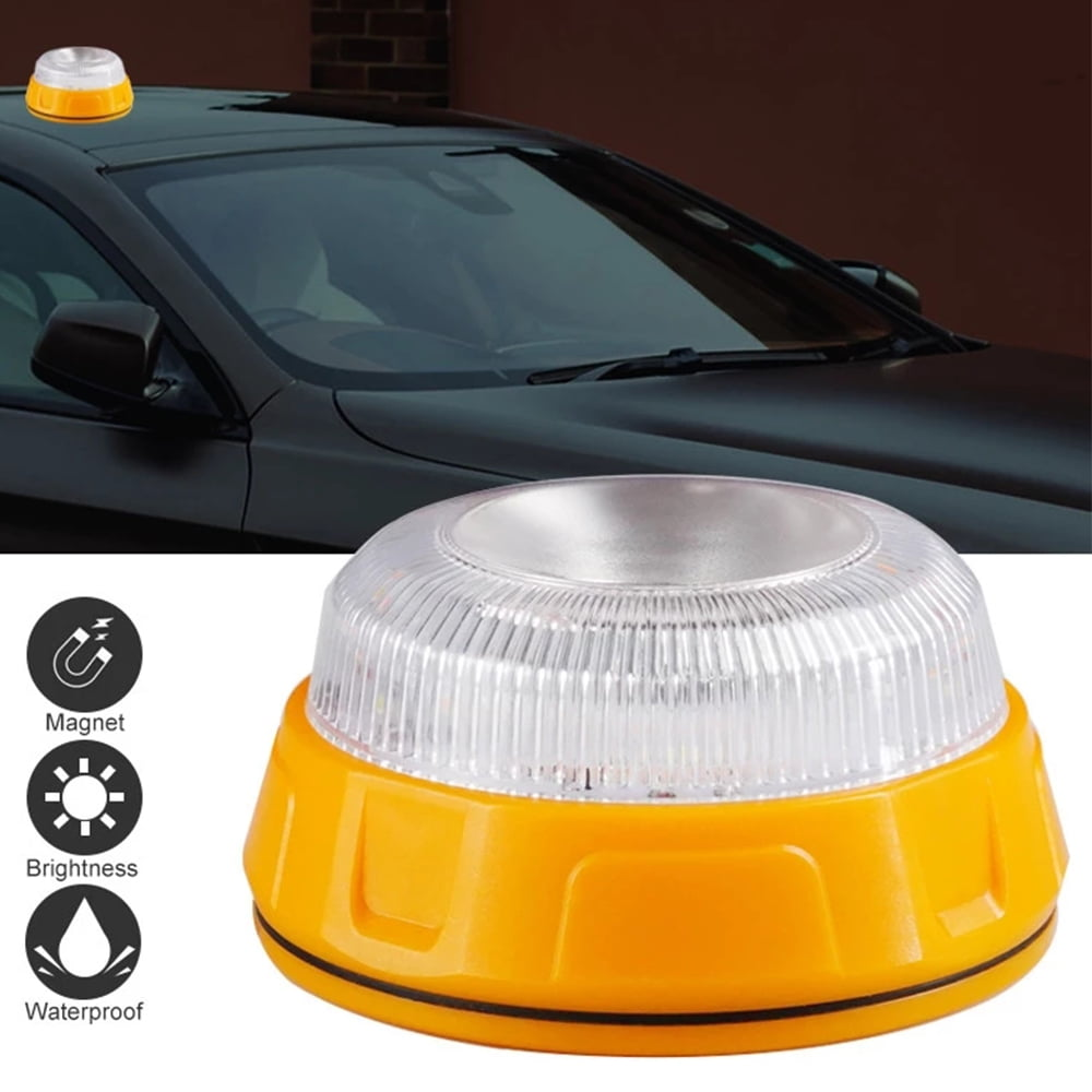 Ein orangefarbenes und klares Notlicht sitzt auf einem Autodach, mit Symbolen für Magnet, Helligkeit und wasserdichte Eigenschaften.