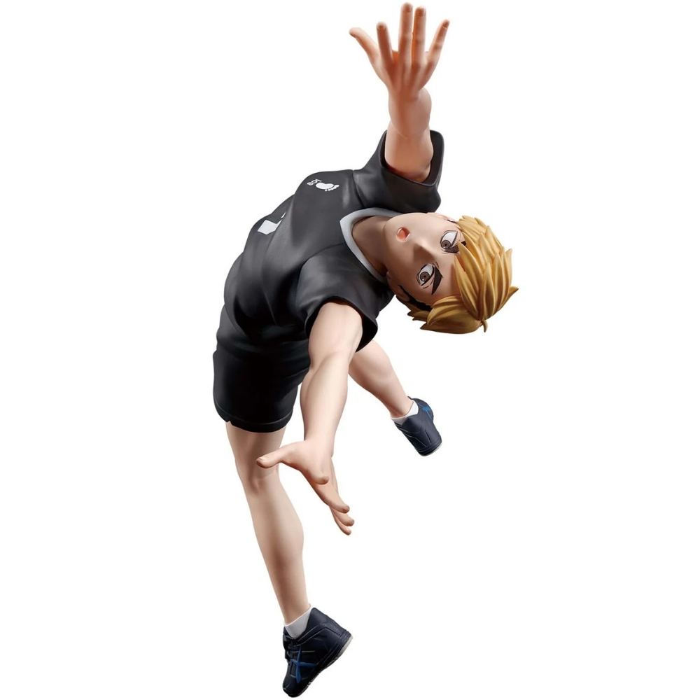Una statuetta di un giocatore di pallavolo a mezz'aria, con uniforme e scarpe nere. Il giocatore ha i capelli biondi e allunga un braccio.