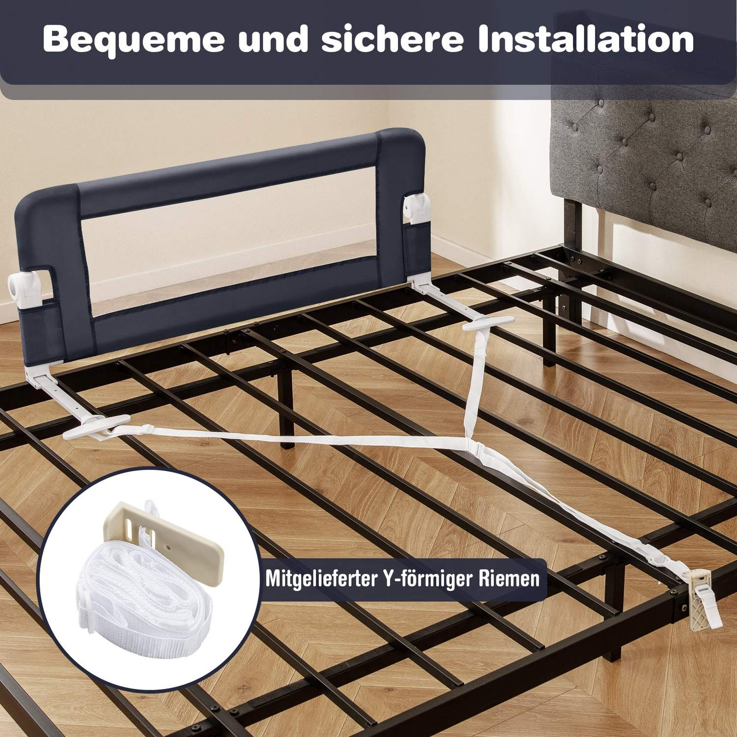 Una estructura de cama con una barrera de cama azul oscuro. Una correa blanca sujeta la barrera al marco. También se muestra una correa en forma de Y.