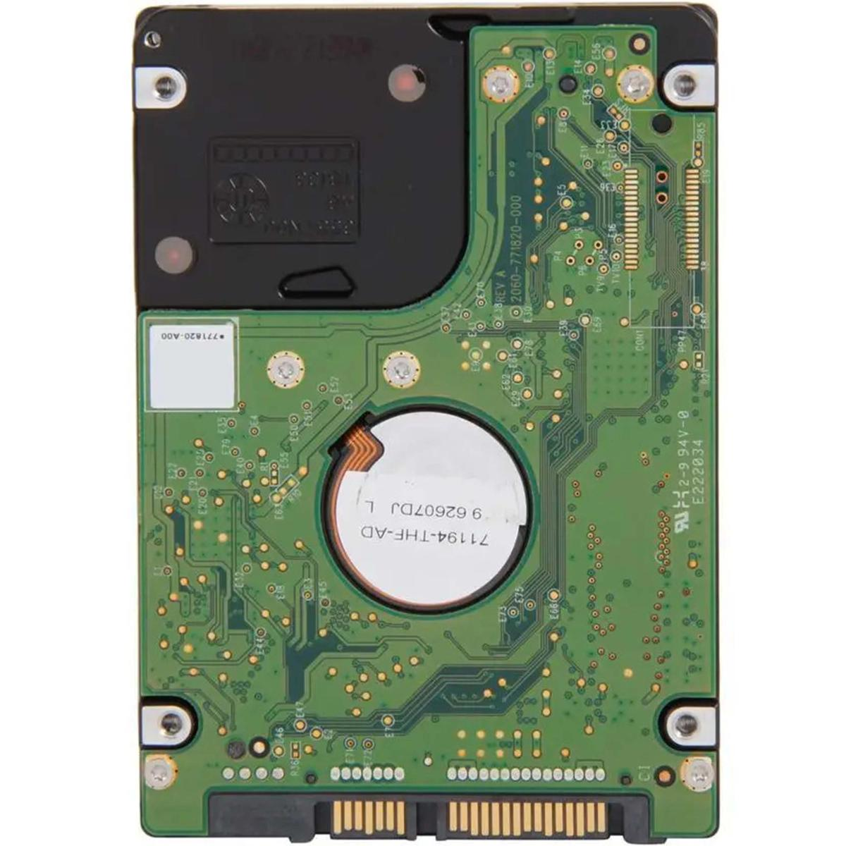 Sono visibili i componenti interni di un disco rigido. Sono mostrati il circuito stampato verde, i componenti neri e i connettori metallici.