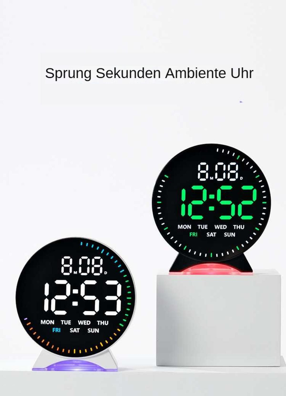 Zwei Digitaluhren mit Datum und Uhrzeit. Die obere Uhr zeigt 12:52, die untere 12:53. Beide sind schwarz und grün.