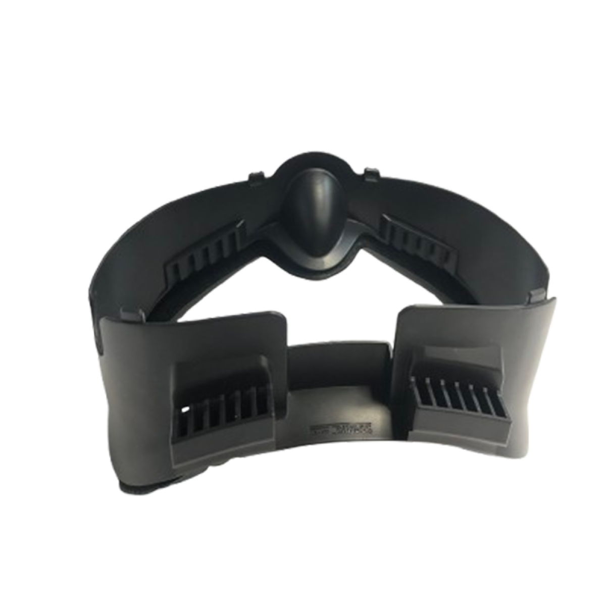 Czarny plastikowy element zestawu słuchawkowego. Ma zakrzywioną górę i dwie prostokątne sekcje z otworami wentylacyjnymi. Tło jest czarne.